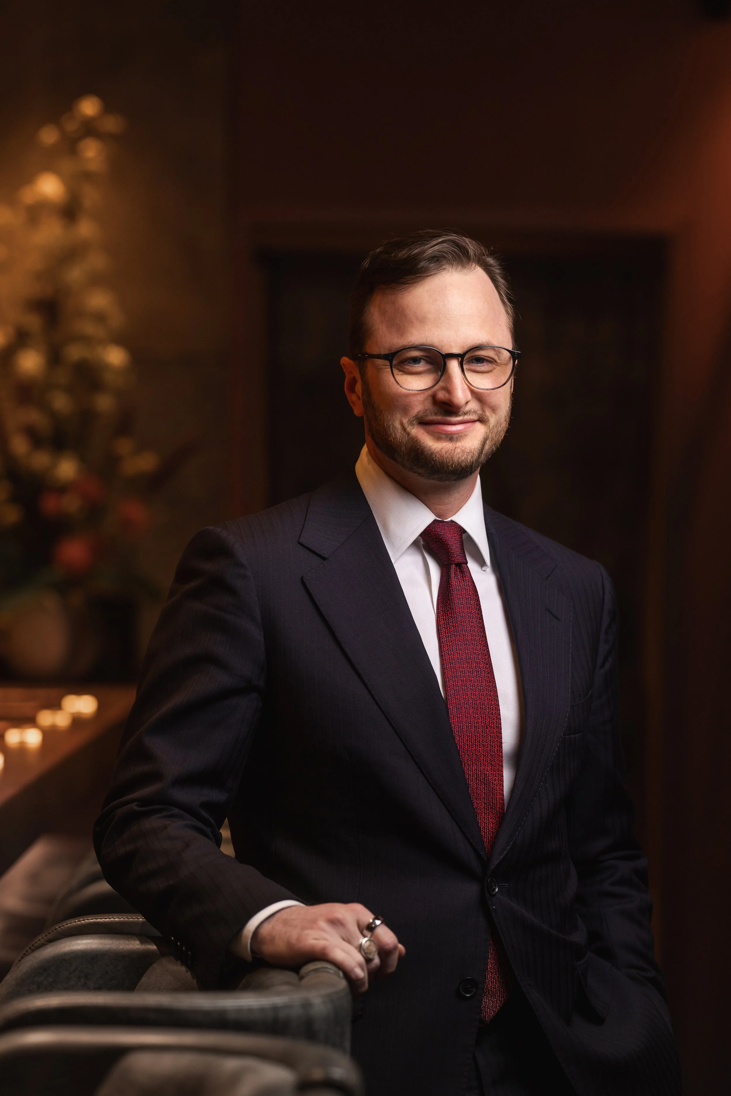 The General Manager, composed and confident, posed for the camera.