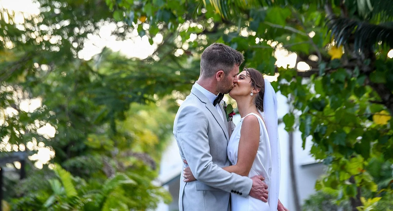 Sealed with a Kiss
A timeless moment of love amid tropical beauty.