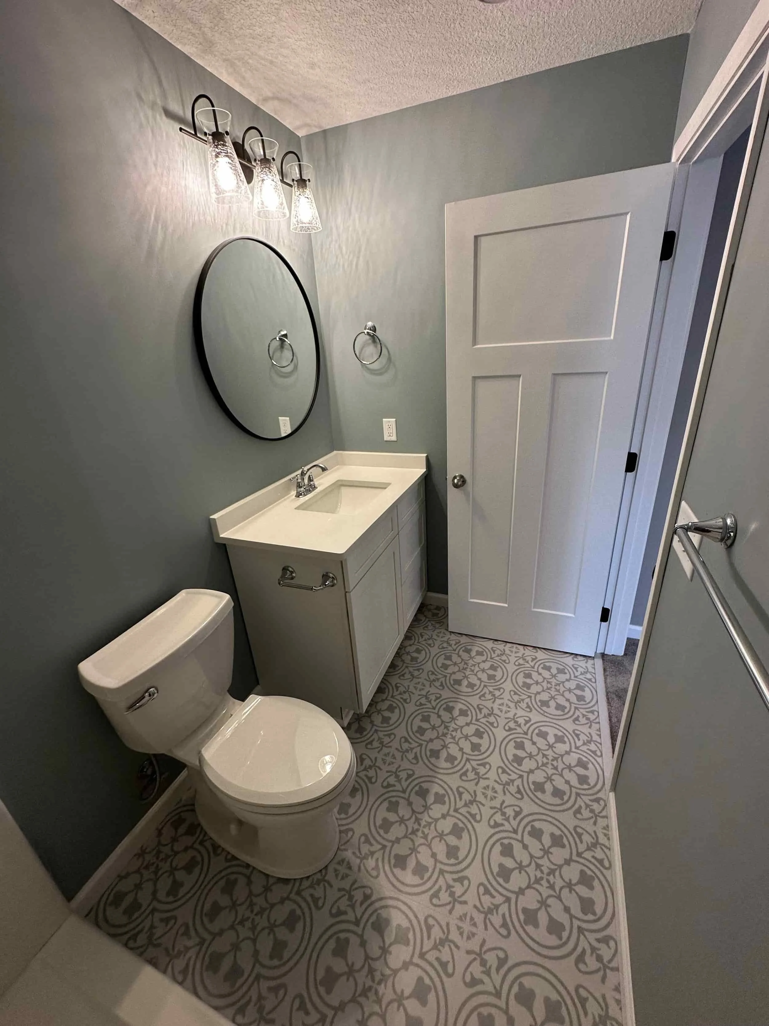 Bathroom Update, Vanity, LVT Flooring, Toilet, Lighting