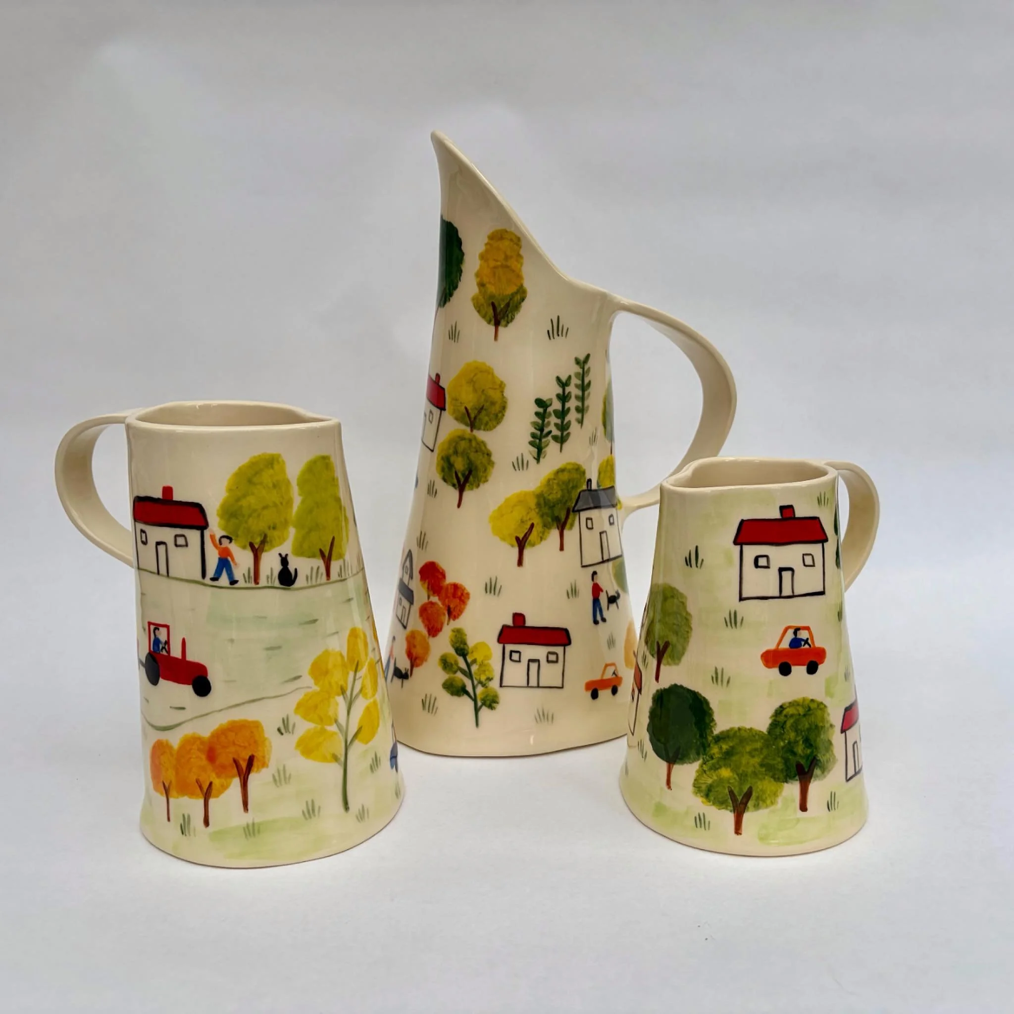 Hand built jugs of different sizes #contemporyceramics #ceramics #potterystudio #handbuiltceramics #earthenware