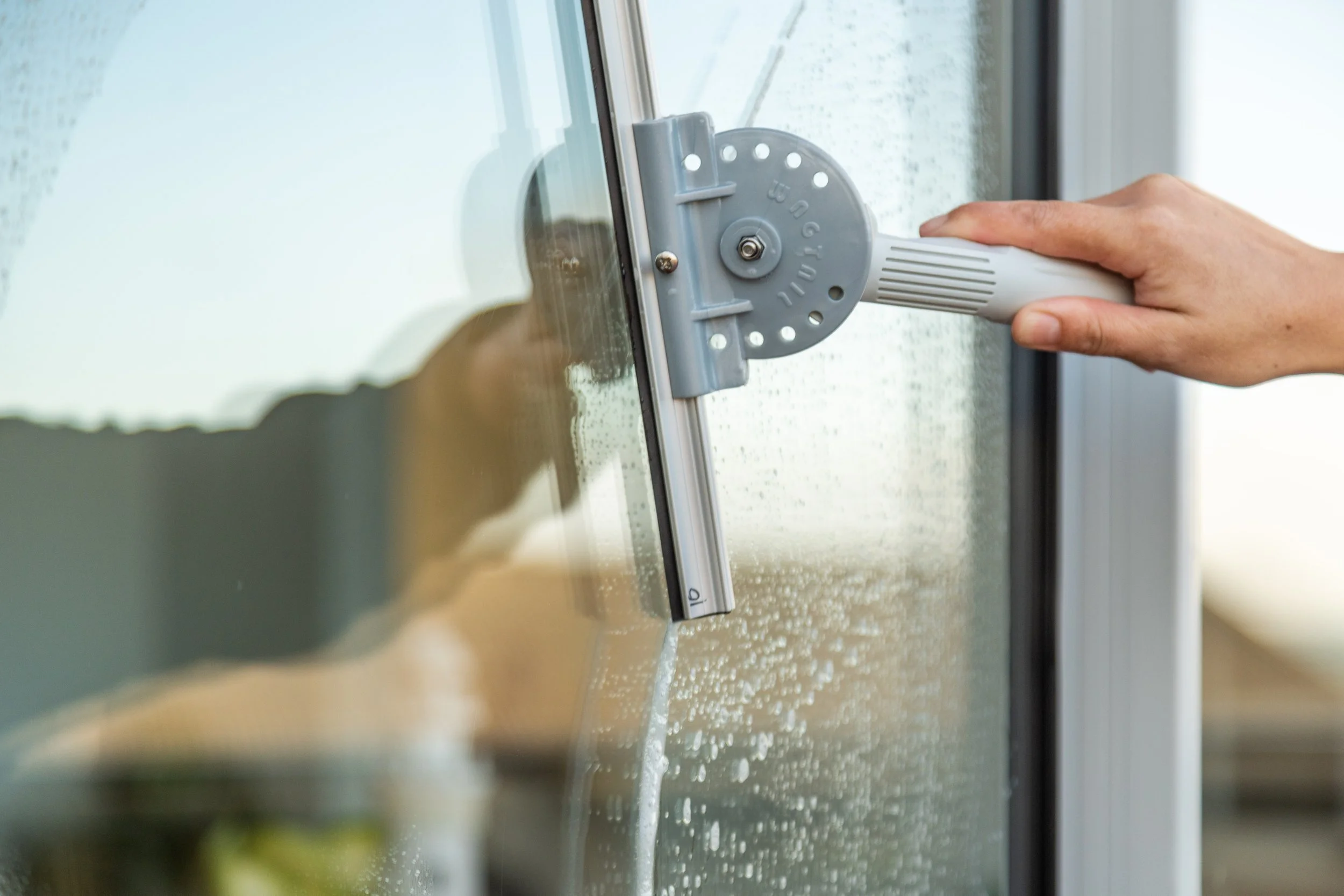 professional squeege at mar window cleaning Gold Coast