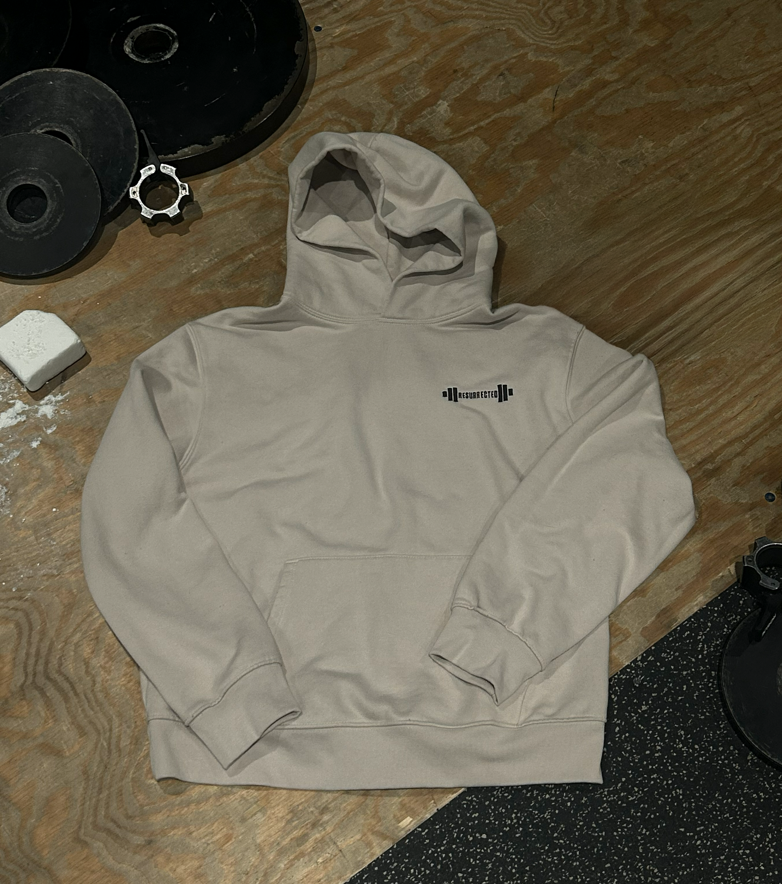 Hoodie-On-Ground-Tan-Front-Final.png