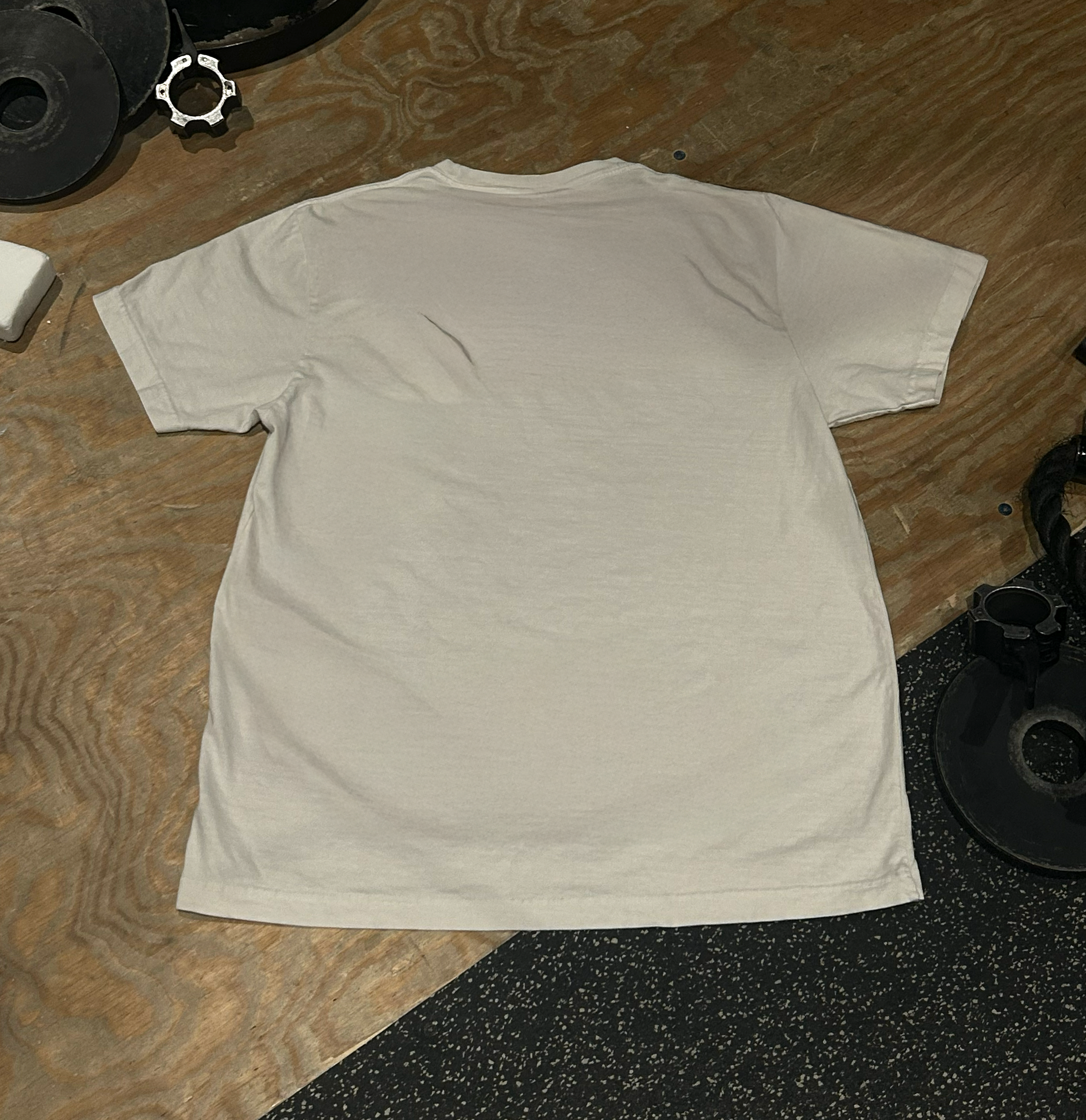 Tshirt-On-Ground-White-Back-Final.png
