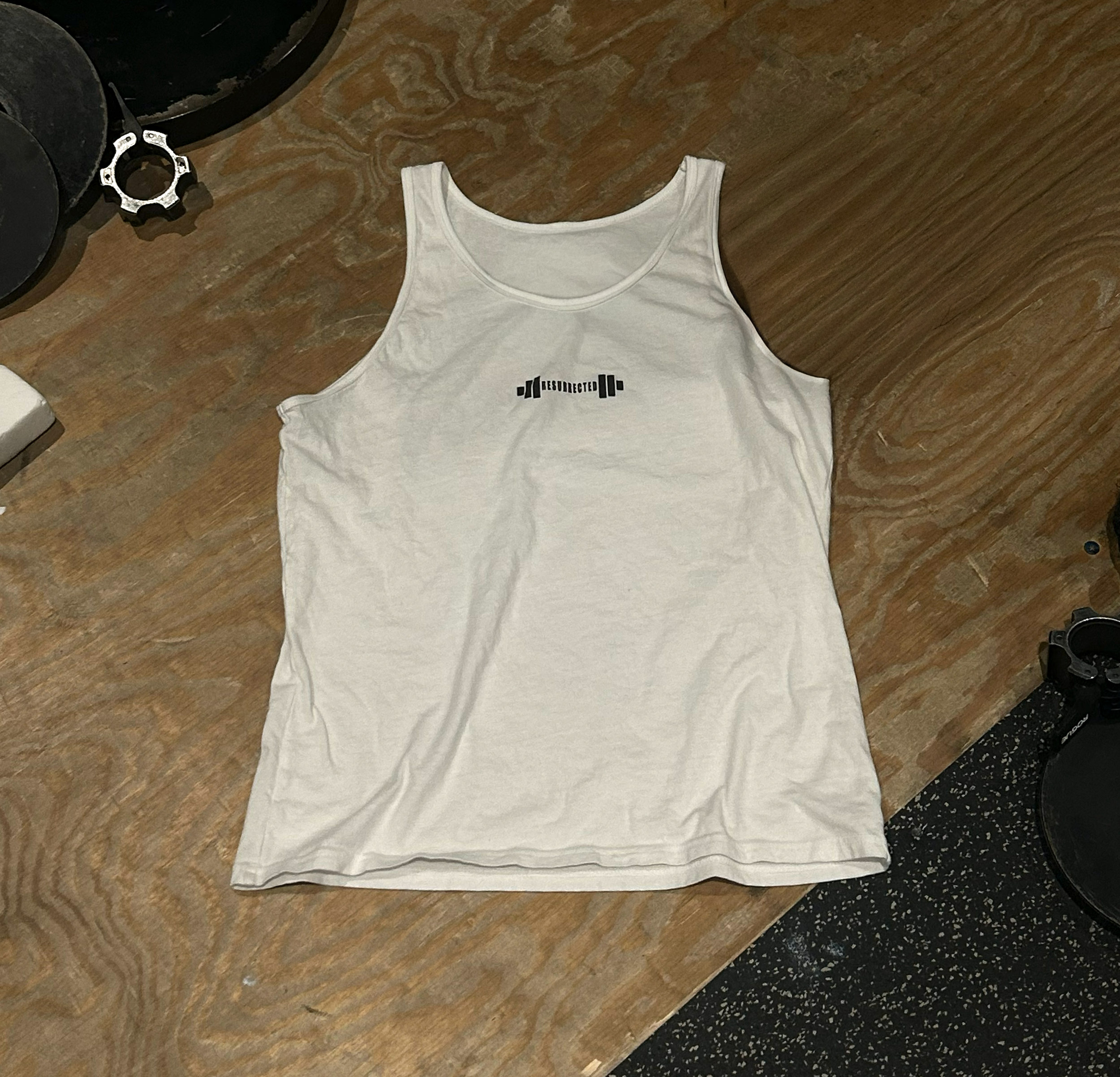 Tanktop-On-Ground-White-Front-Final.png