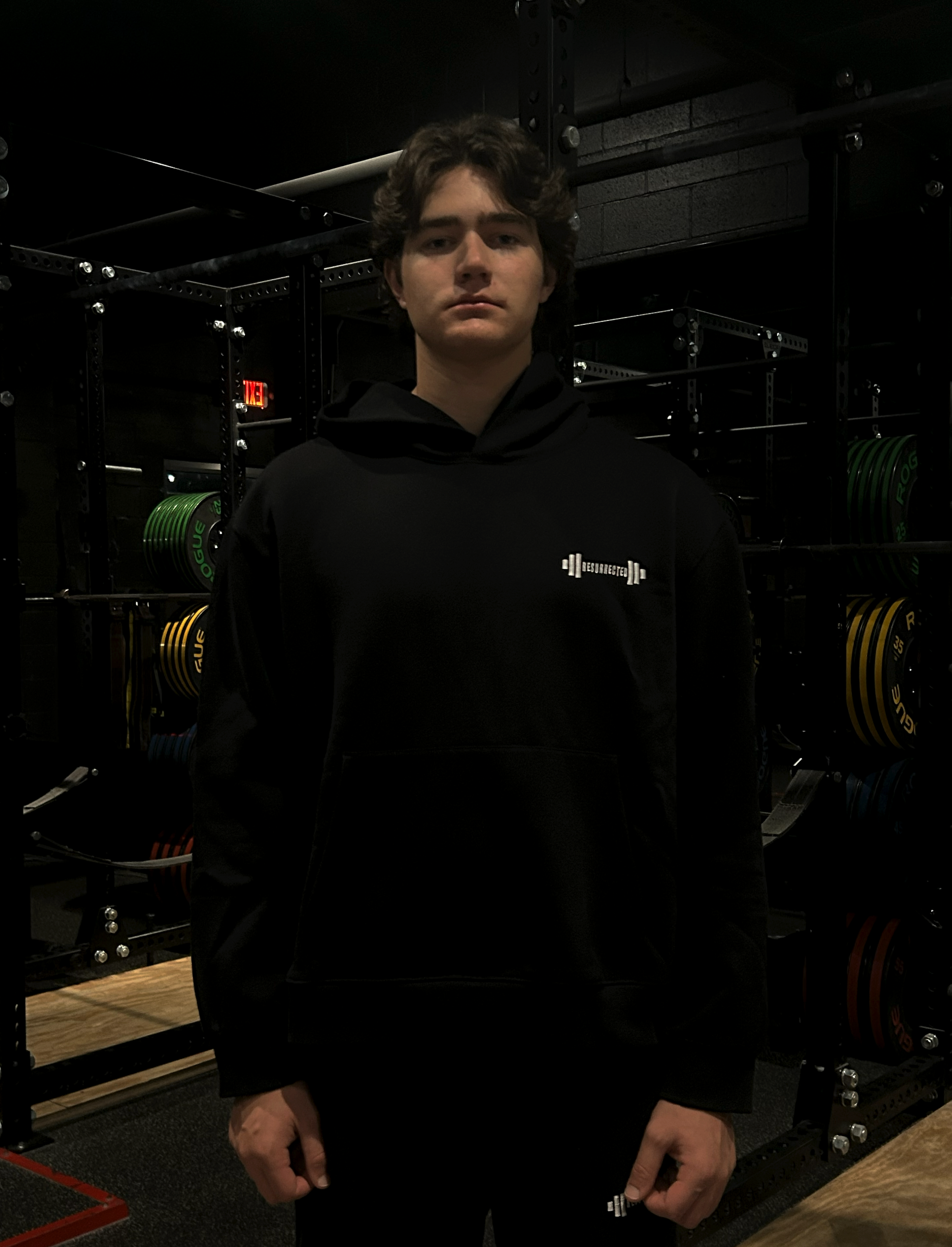 Hoodie-On-Person-Black-Front-Final.png