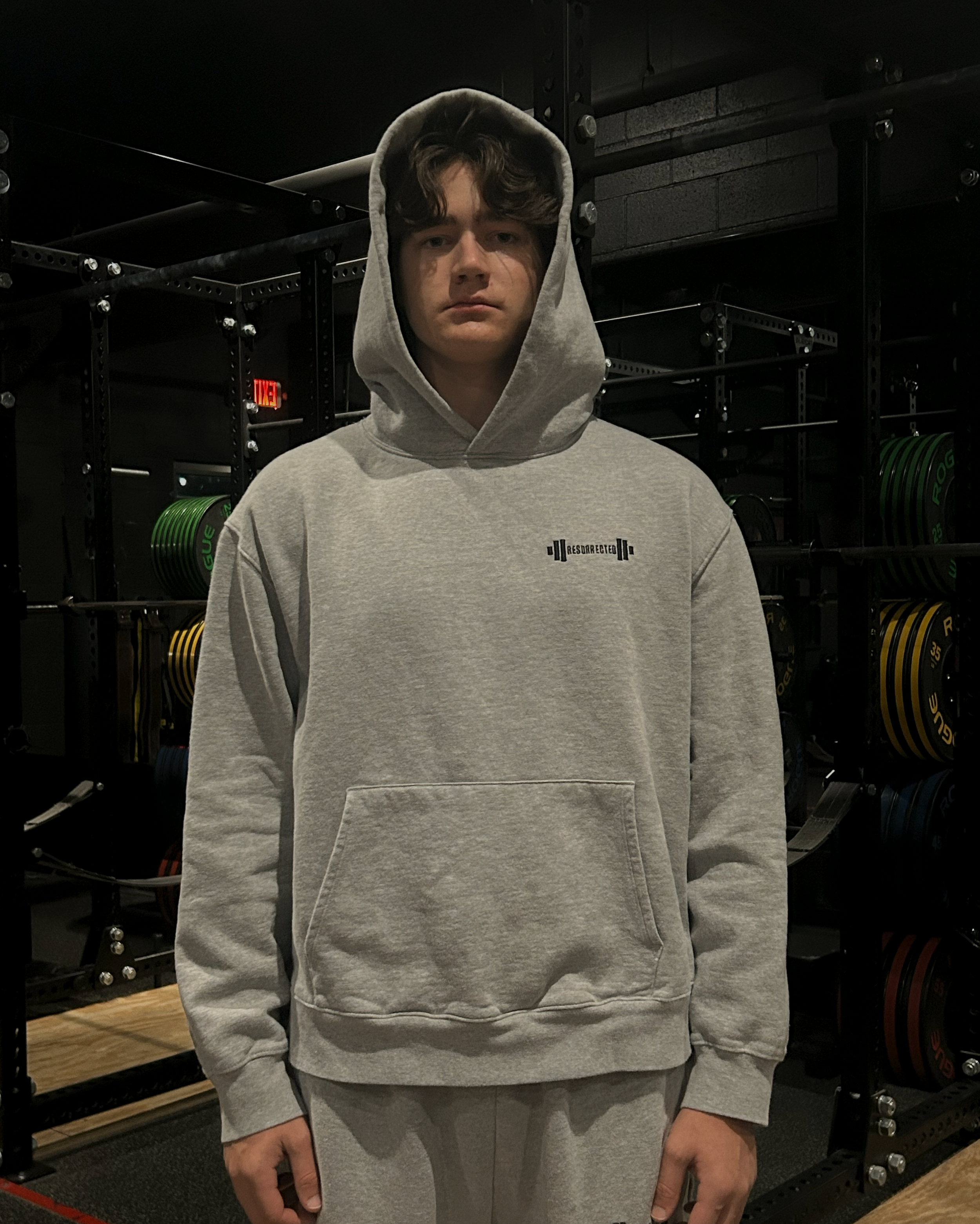 Hoodie-On-Person-Grey-Front-Hood-Up-Final.png