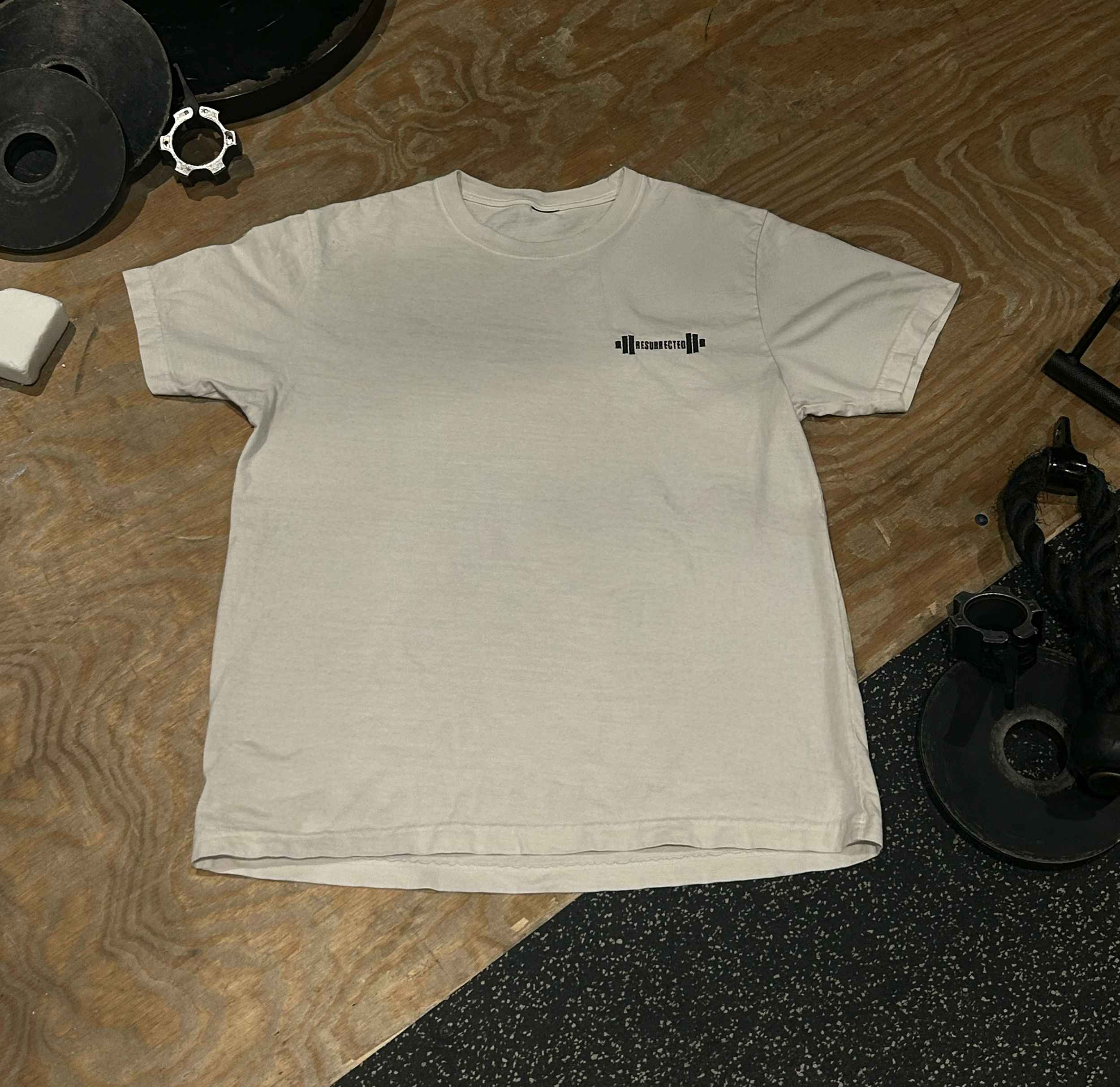 Tshirt-On-Ground-White-Front-Final.png