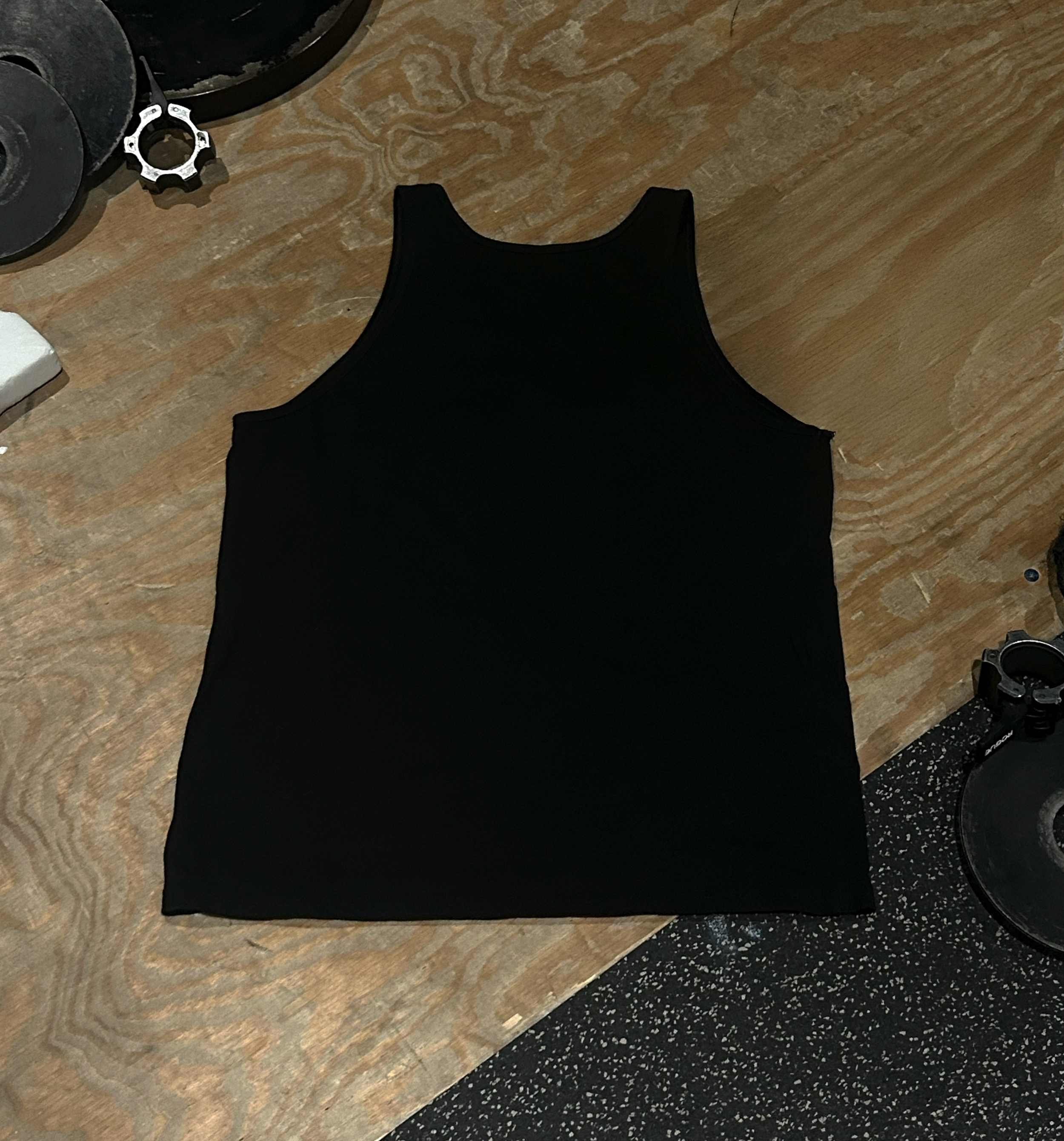 Tanktop-On-Ground-Black-Back-Final.png