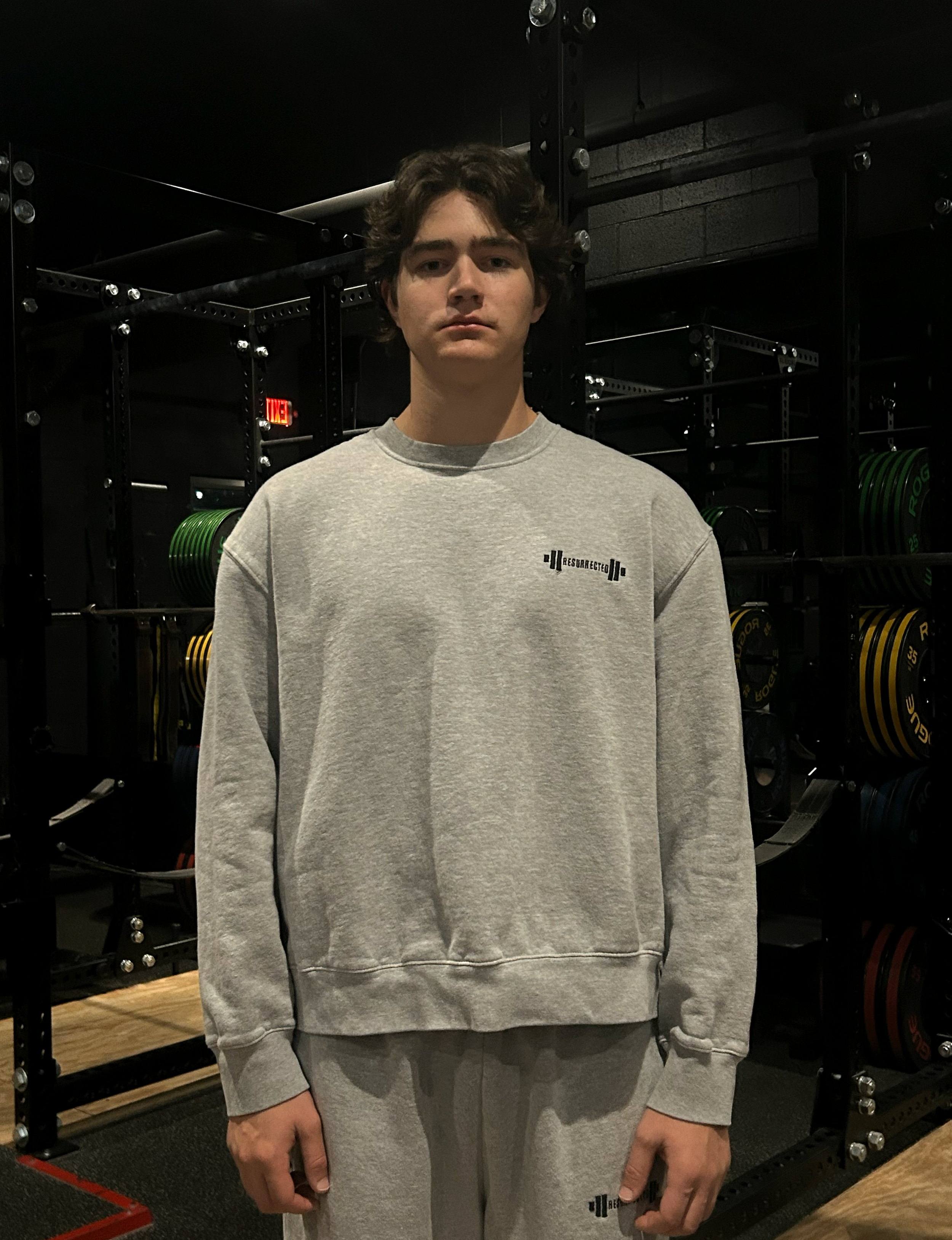 Crewneck-On-Person-Grey-Front-Final.png