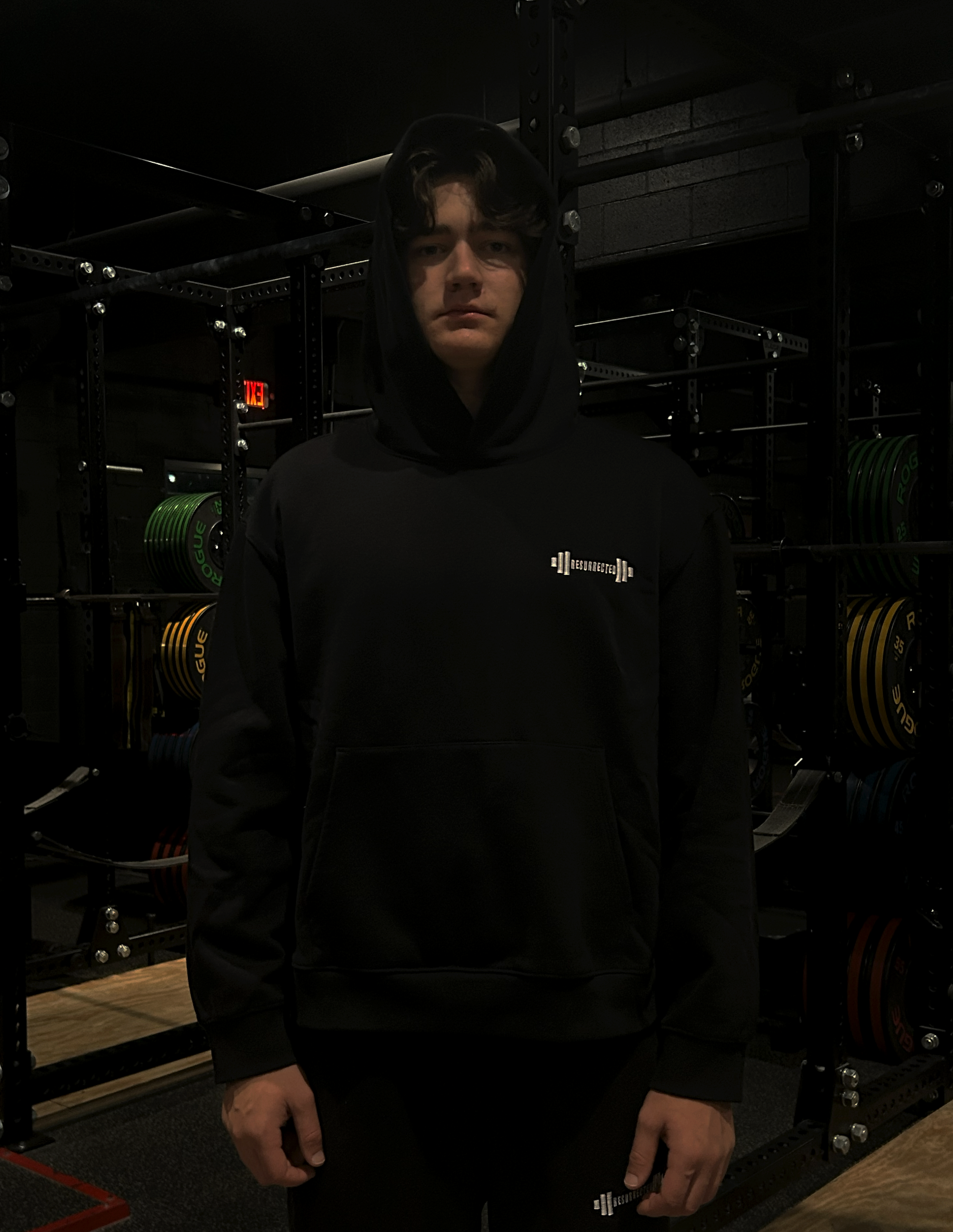 Hoodie-On-Person-Black-Front-Hood-Up-Final.png