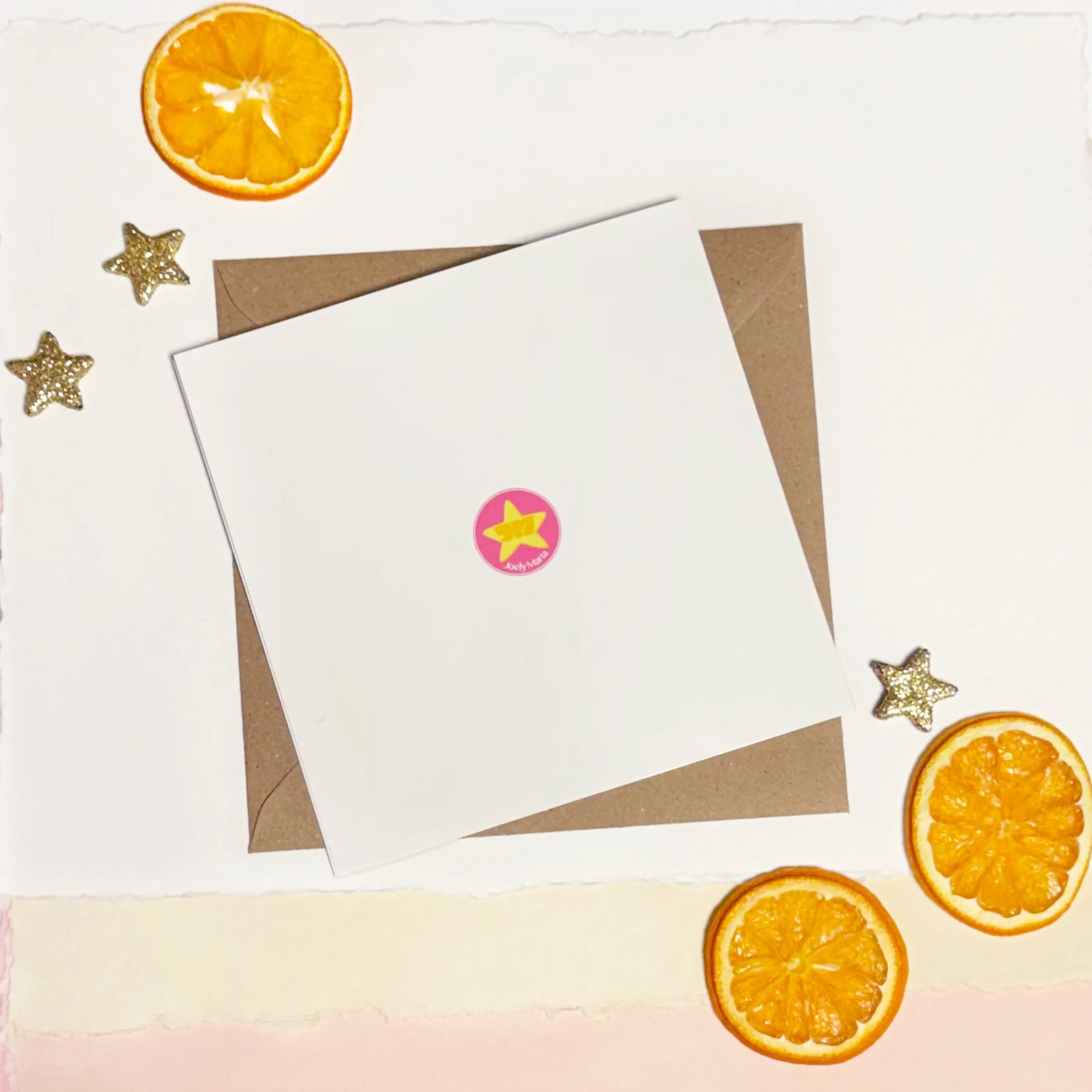 Christmas card back Joely Maria logo