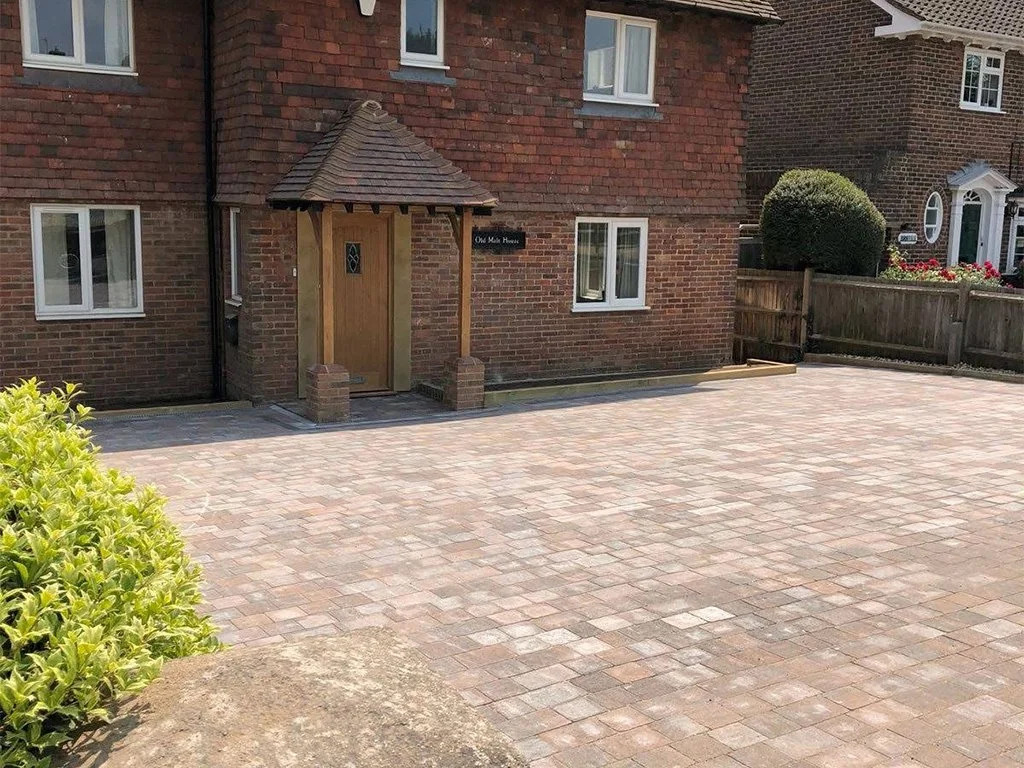 Brickwork driveway in front of house using
