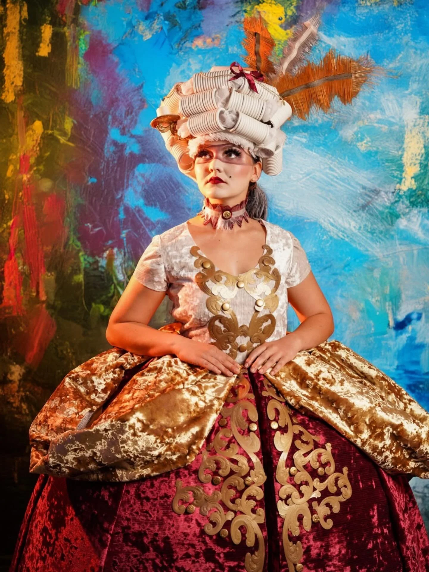 Take a closer look and you will see &ldquo;Crushed&rdquo; colorway Fireside.  This luxurious pattern not only looks great in this Baroque inspired Fashion Show entry it&rsquo;s also amazing on upholstered pieces!  Want to see more?  Please visit, www