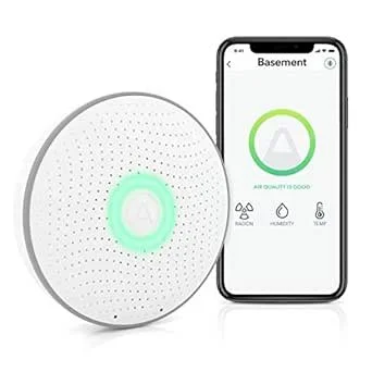 Smart air quality monitor with a circular design and a mobile app display showing good air quality.