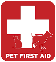 Red Pet First Aid sign with white cross, outline of a cat and a dog.