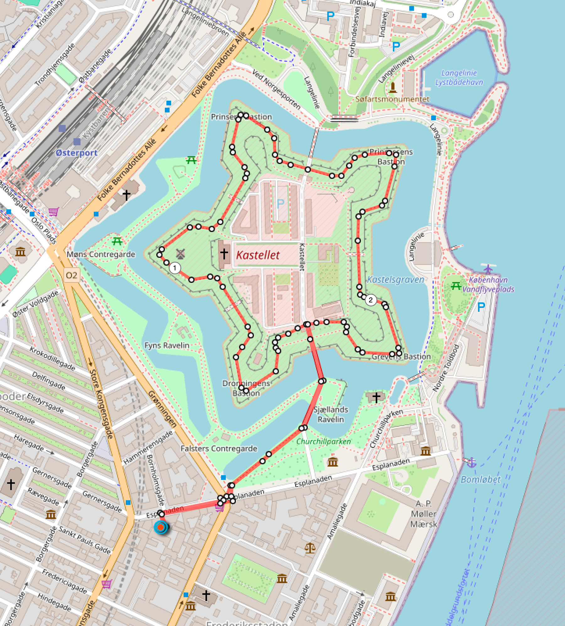 Map of Kastellet, a historic fortress in Copenhagen, Denmark, showing walking routes, water bodies, parks, and surrounding streets.