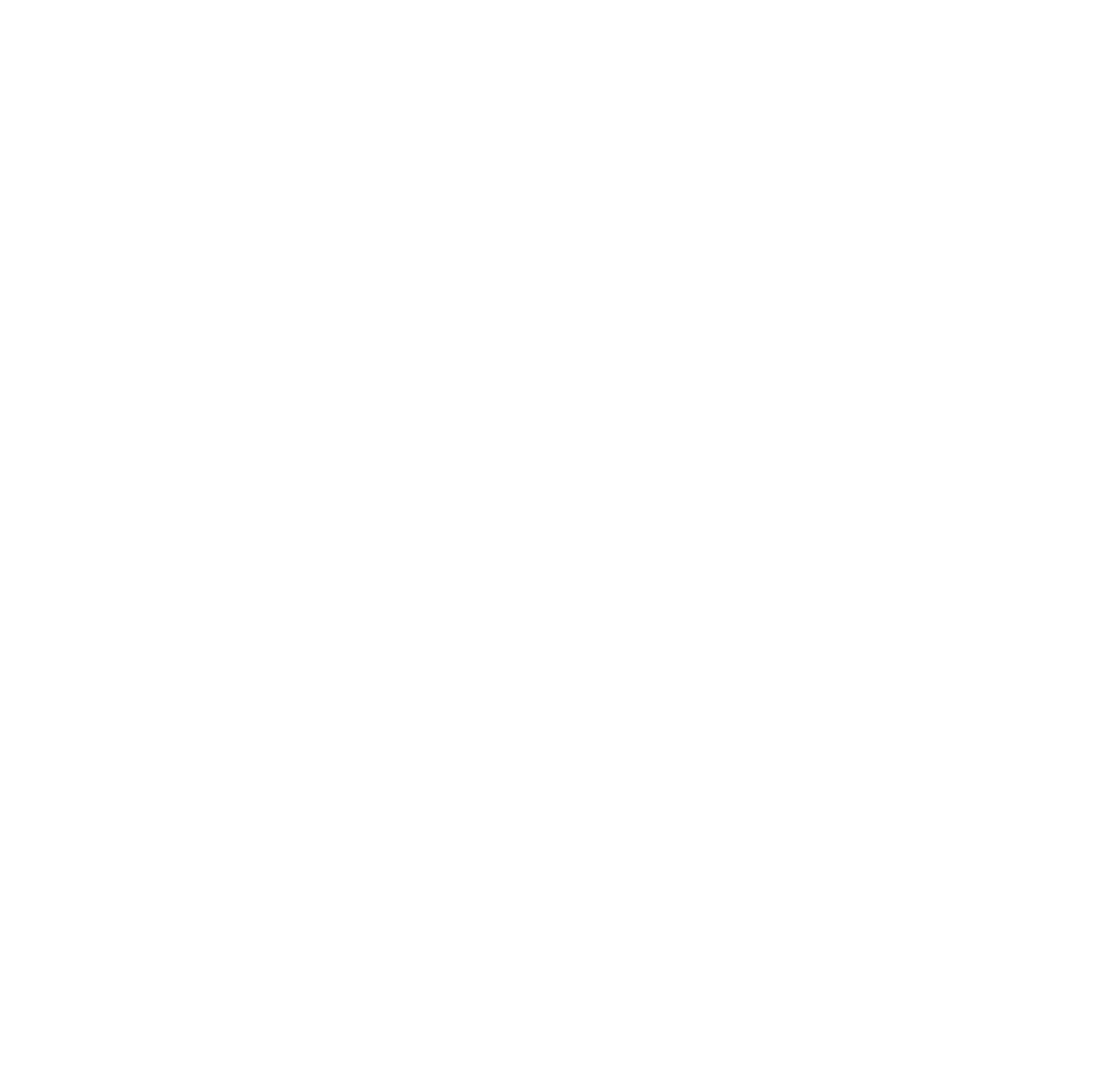 A black and white close-up image of a tree trunk cross-section showing growth rings. Built by the Timber, Stone, & Steel lead contractor, Taylor Prouty, in Vermont.