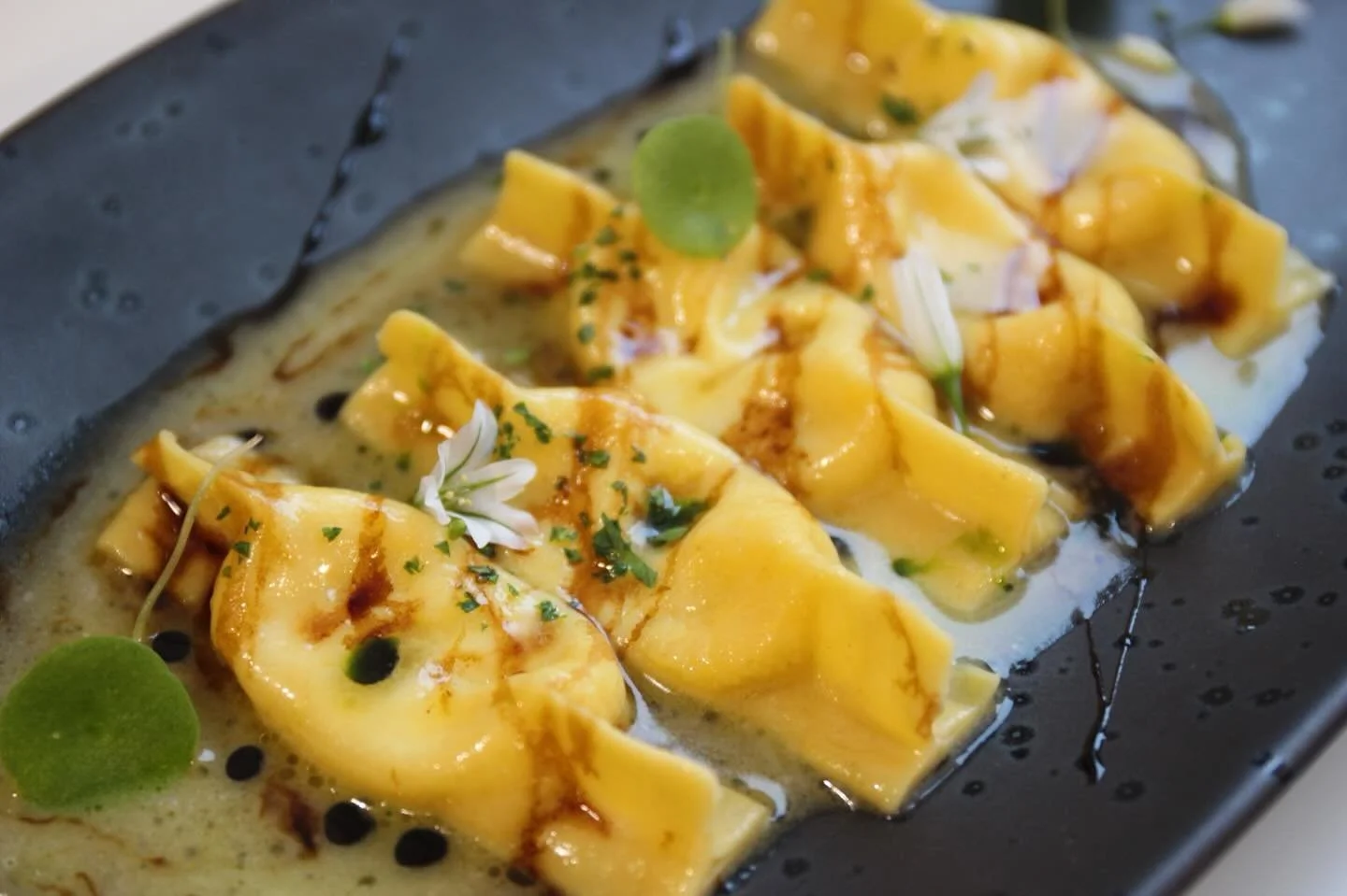 Scarpinocc - Taleggio and cream, Butter emulsion, Balsamic reduction, Wild garlic oil