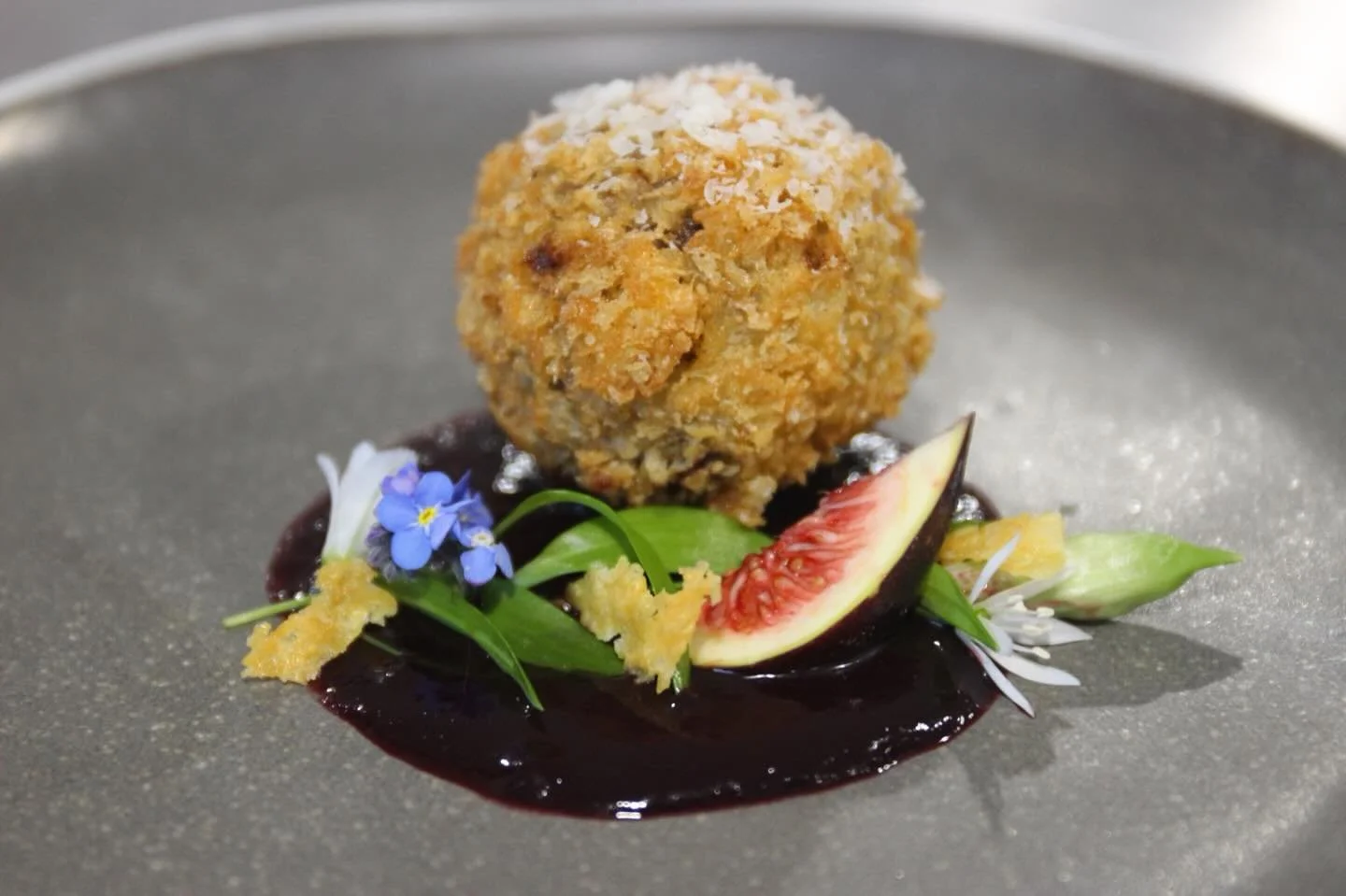 Venison bonbon / Cherry port coulis / Fig / Wild Garlic / Parmesan crisp 🍒