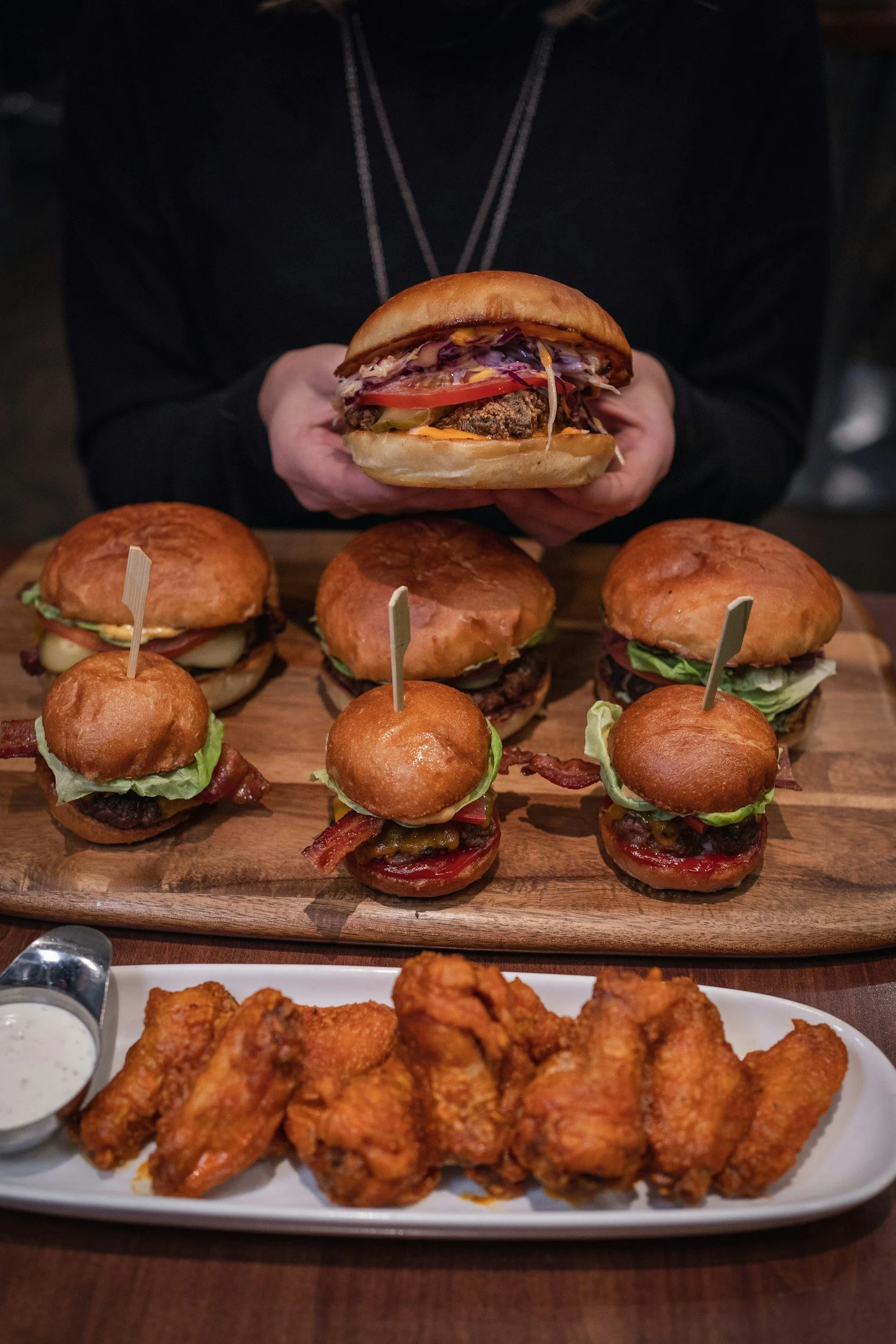 Game day spread with sliders and chicken wings