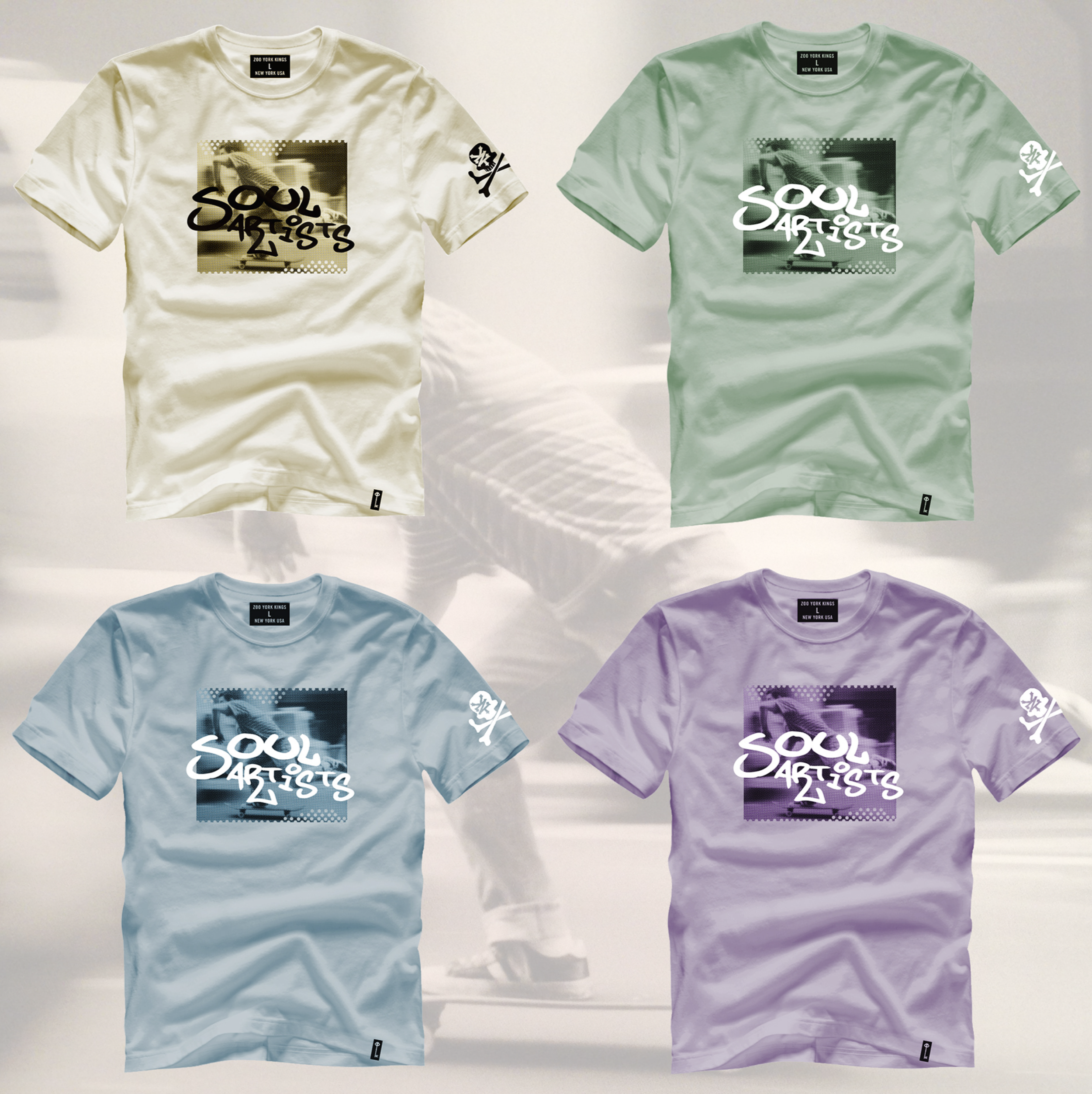 Four t-shirts in different pastel colors (cream, mint, baby blue, lavender) arranged in a 2x2 grid, each with a graphic design featuring the words "Soul Artists" over a blurred black and white photo and a brand label at the collar.
