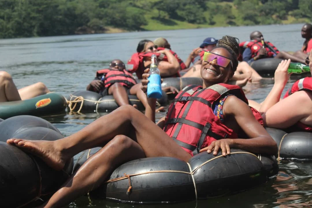 Tritons rugby tour group enjoying river adventure experience in Uganda