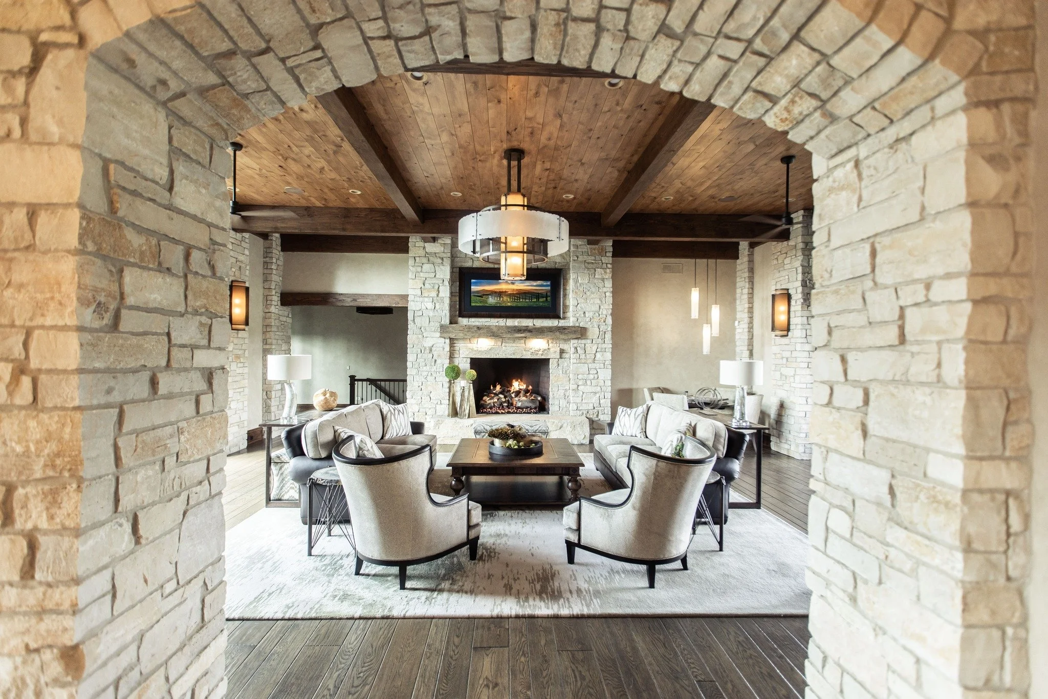 We loved bringing the warmth of a mountain chalet to this home 🗻🔥. The stone walls and elegant arches create a great room full of character and charm.

 #construction #GeneralContractor #contractor #luxuryhomedesign #generalcontractor #AttentionToD