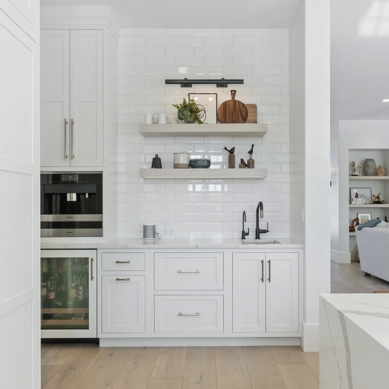 Meet the ultimate hydration station. 💧☕ With a built-in coffee machine and beverage fridge, this custom setup keeps your favorite drinks perfectly within reach&mdash;morning, noon, or night. 🥂

Interior Designer: @houseofjuniperdesign 

 #buildvcc 