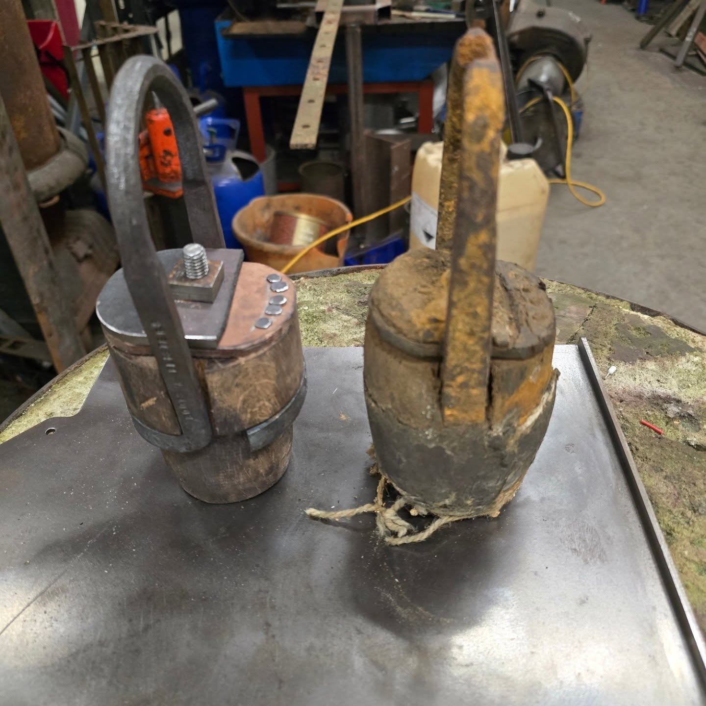 Making and fitting the non return valve.

In-house heritage engineering undertaken by Happy, our Blacksmith.

As you can see from the second picture, I had no idea what was in this pipe. It was rammed full of all sorts of stuff. After hours of gently
