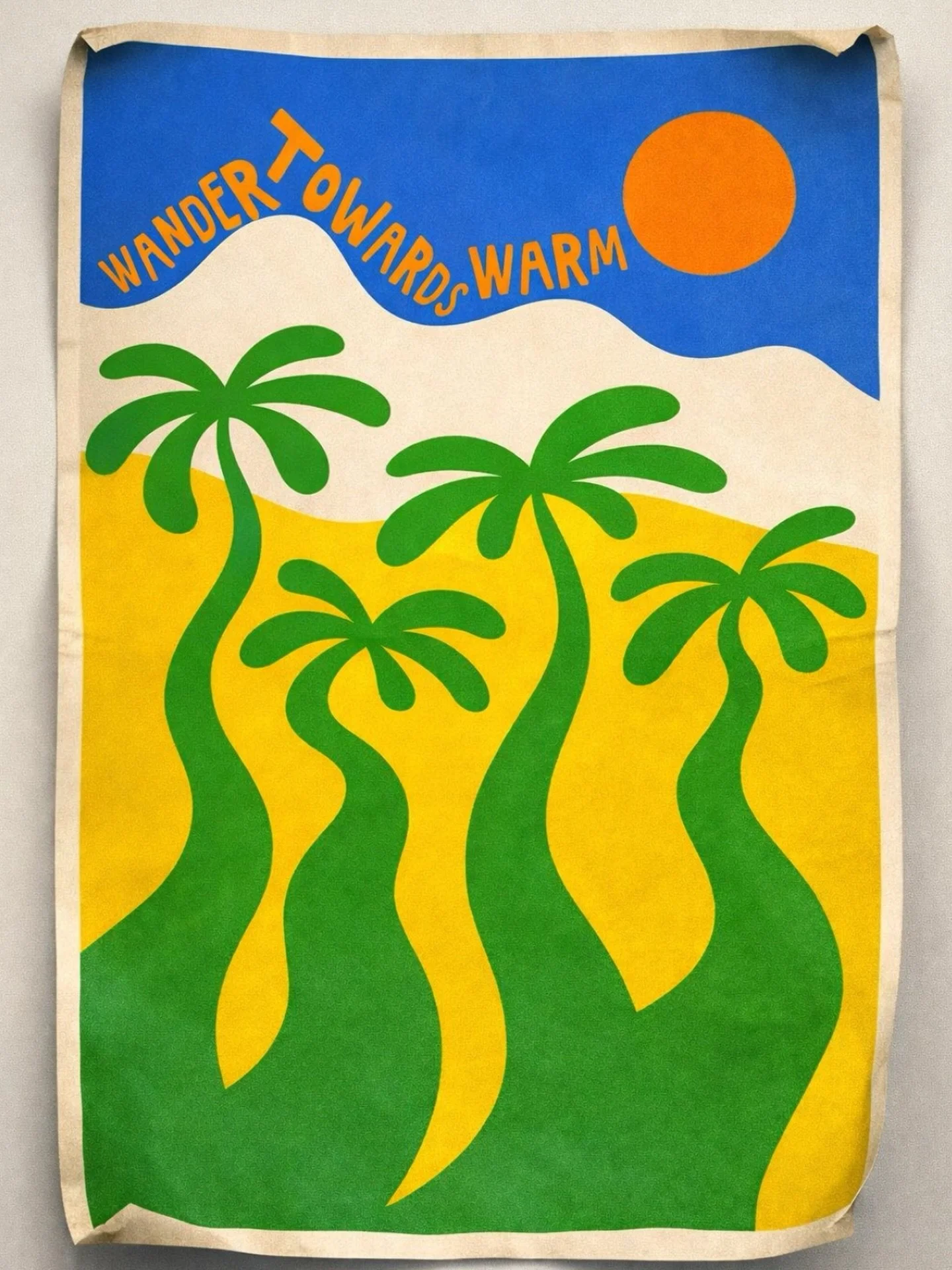 Wander towards warm.

Like a photograph left in the sun too long.
Like a postcard you almost forgot you saved.
Like a summer that never really ended just faded soft at the edges.

Big sky.
Burnt-orange sun.
Palms frozen mid-sway
like a still from an 