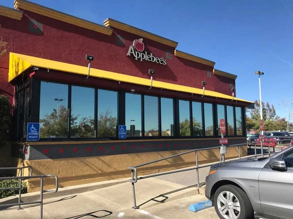 Applebee's restaurant with commercial window tinting in Redding, CA by Reeves Window Tinting