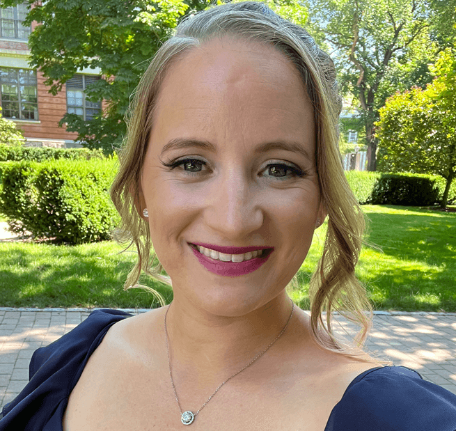 Jennie Berges licensed mental health counselor and perinatal mental health counselor smiling for professional photo.