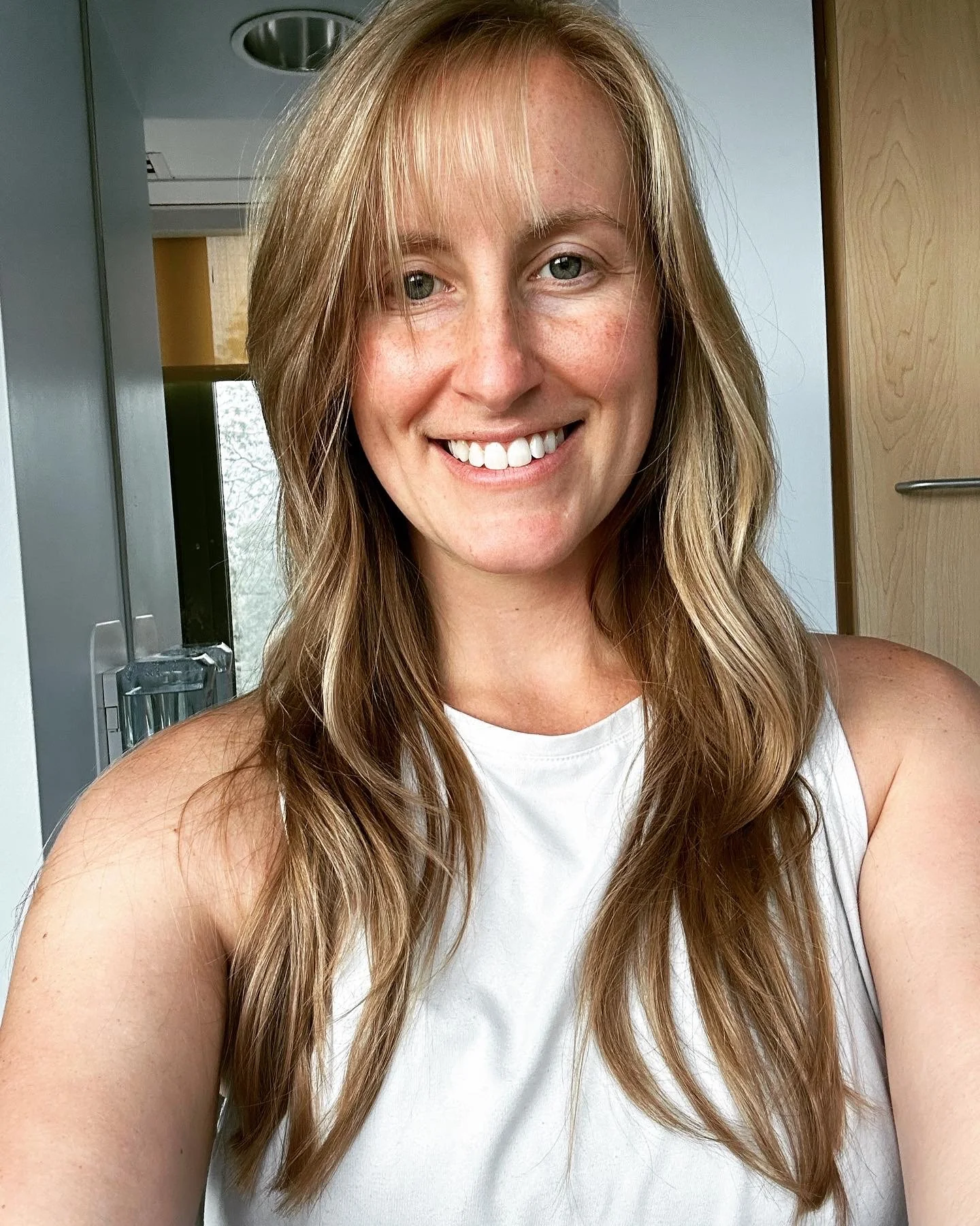 Registered Nurse with The Devoted Village Sarah Keenan smiling for photo in Long Island, NY.