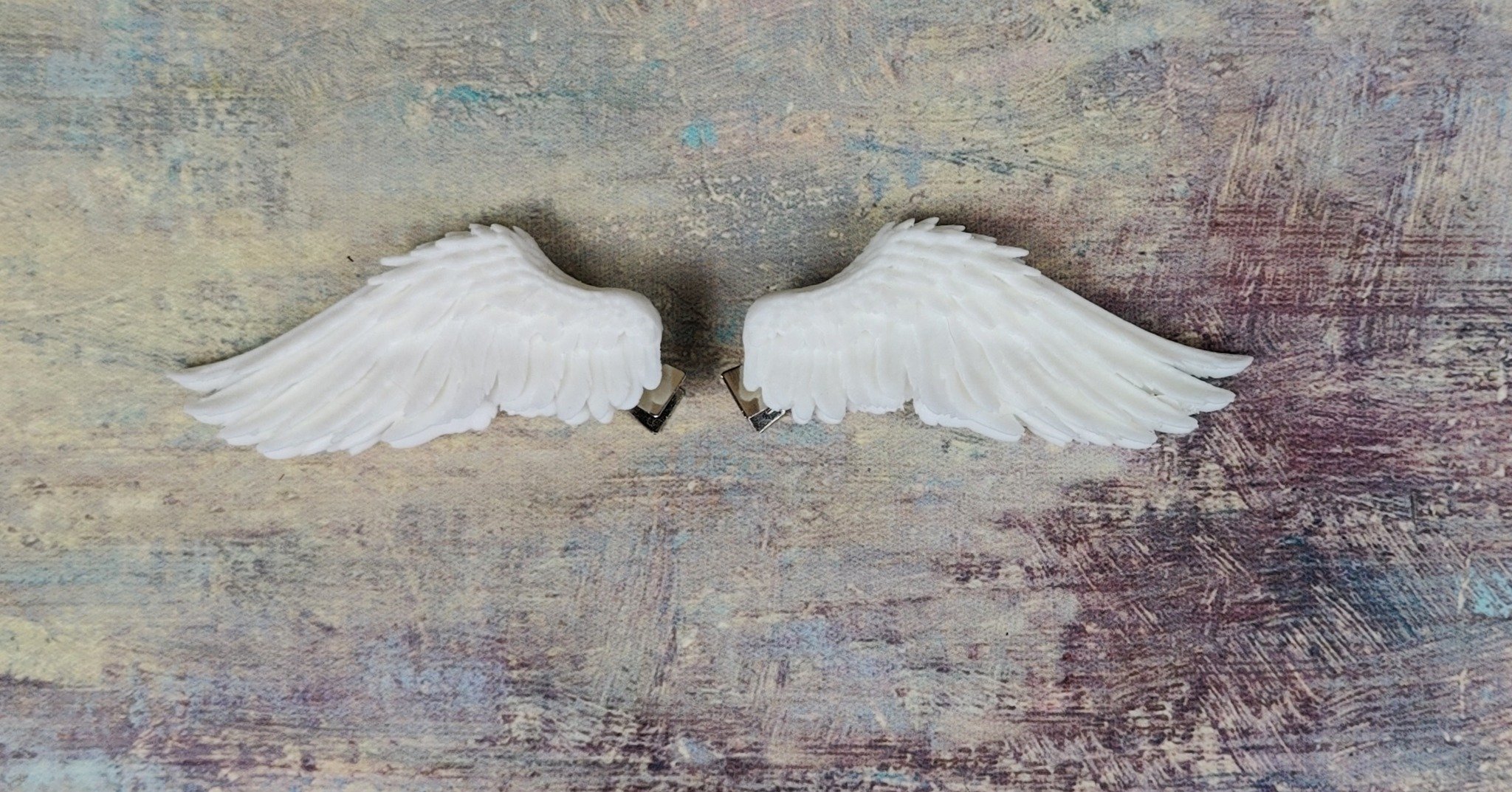 Working on some fresh hair clip designs! This newest piece is an adorable angel wing set ✨😇🕊
You can check them out here at https://lostcreaturescove.etsy.com/listing/4484901632
.
.
.
.
.

#Cottagecore
#Fairycore
#FairyAesthetic
#natureinspired 
#W