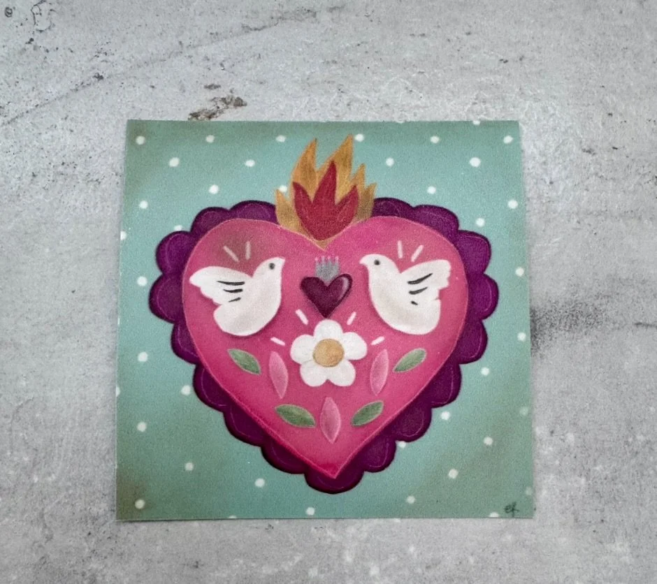 Flaming heart with doves sticker.jpeg