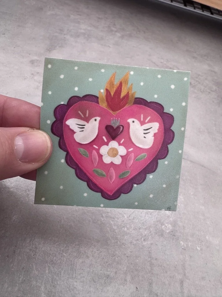 Flaming heart with doves sticker (1).jpeg