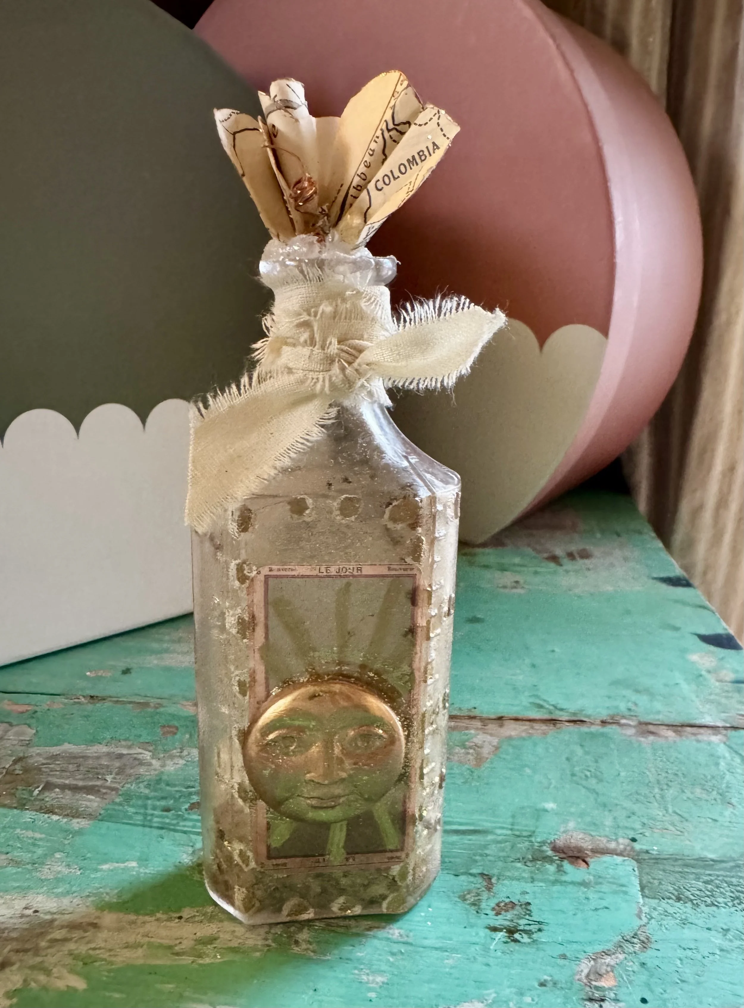 Sun Face Bottle Front.jpeg