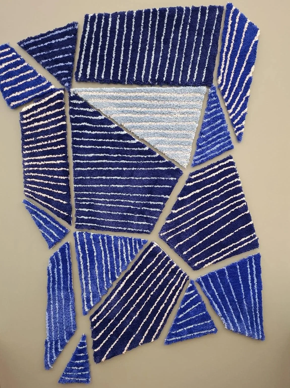  A magnetic backing was applied to the design and it was cut into segments for an interactive experience. 