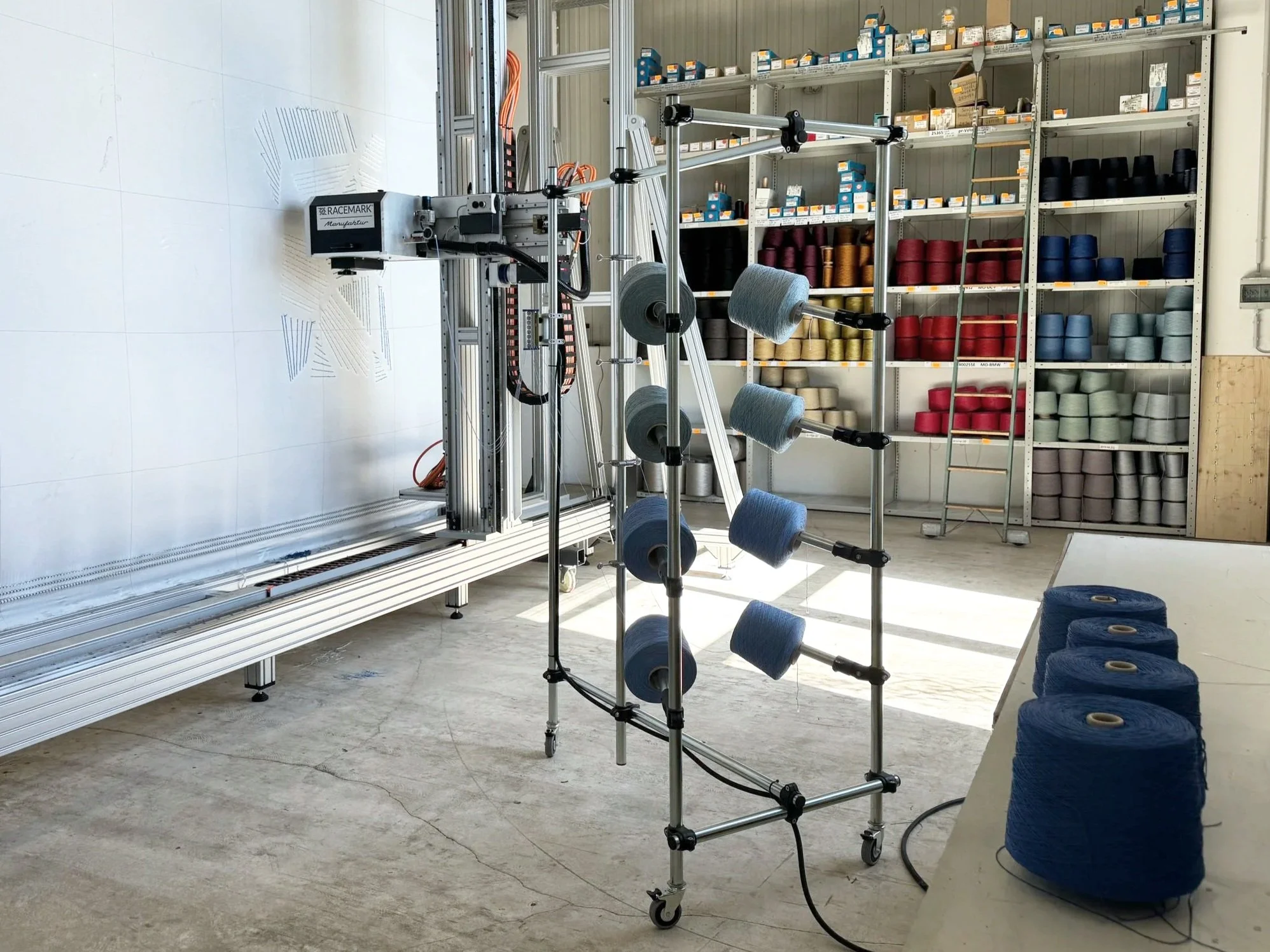  The tufting machine is set to work.  