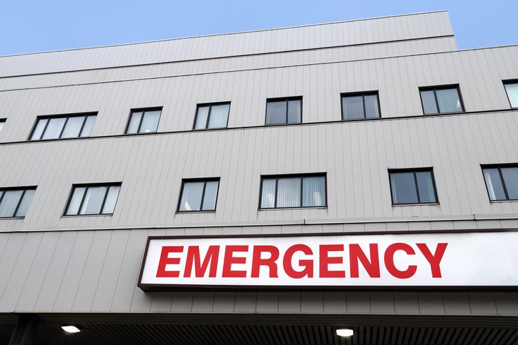 Hospital building with CMS logo overlay