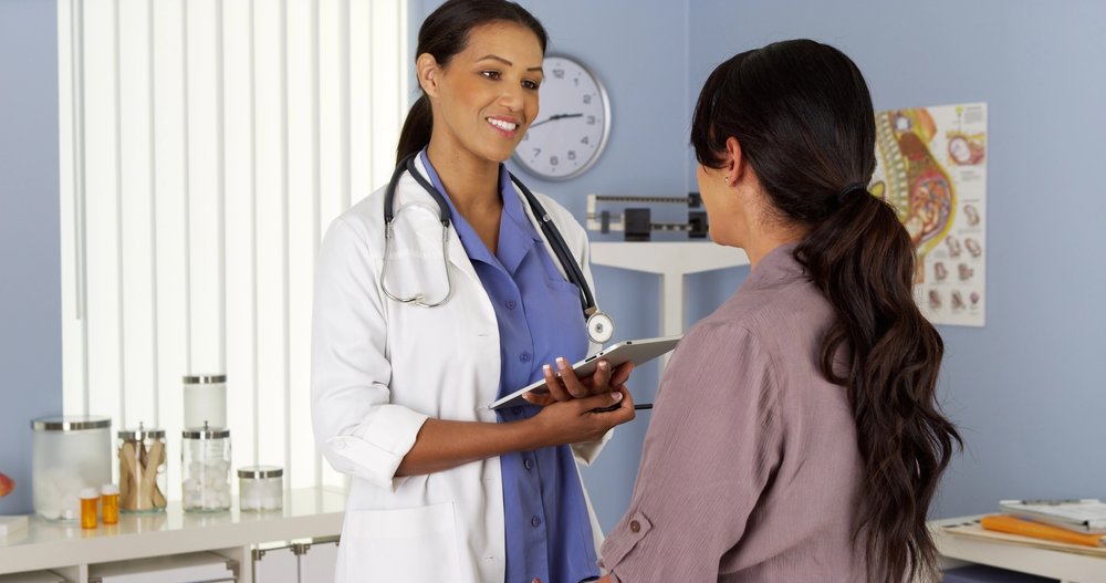Pediatrician with Patient