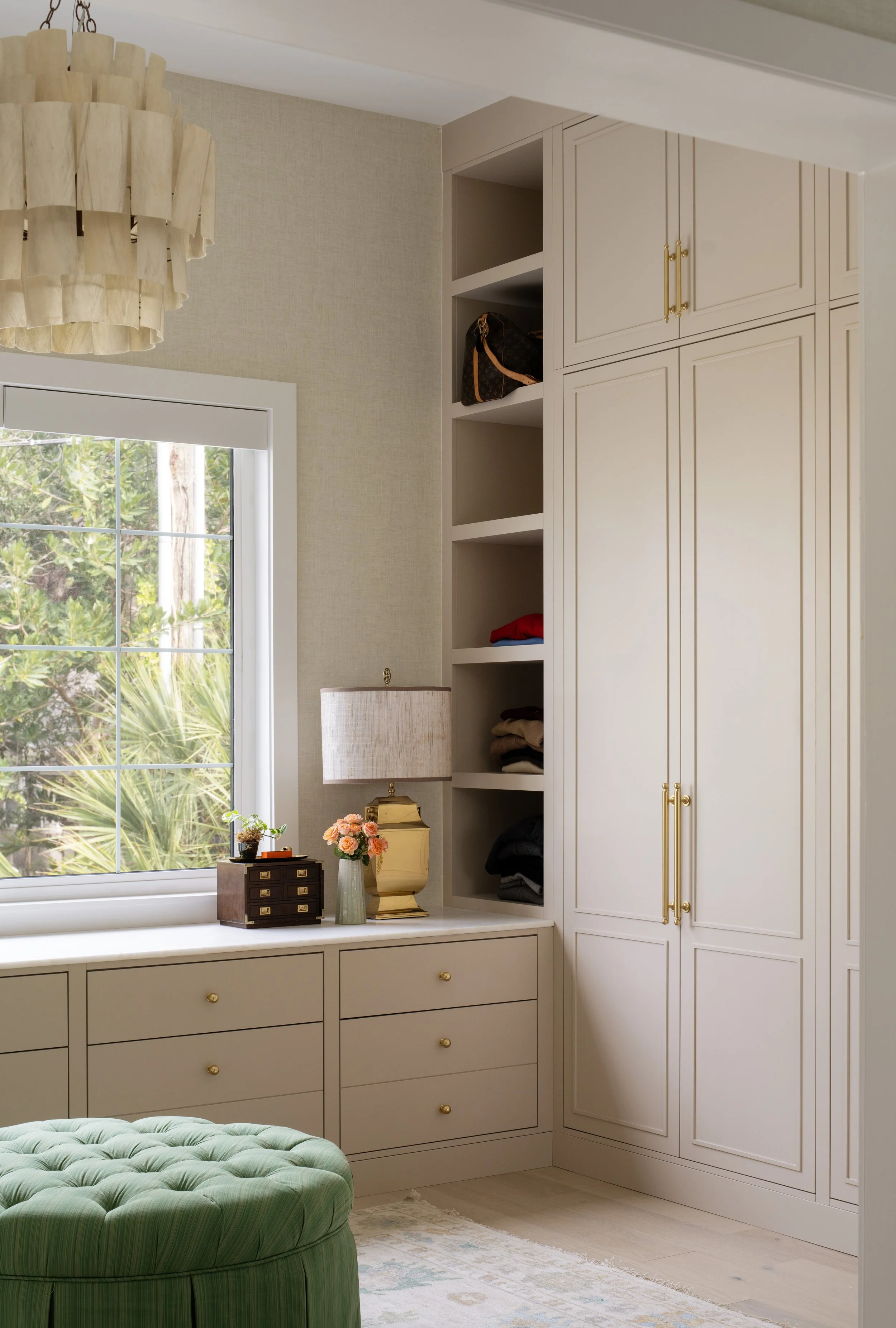 A luxurious closet in a south Tampa residence with purse storage.
