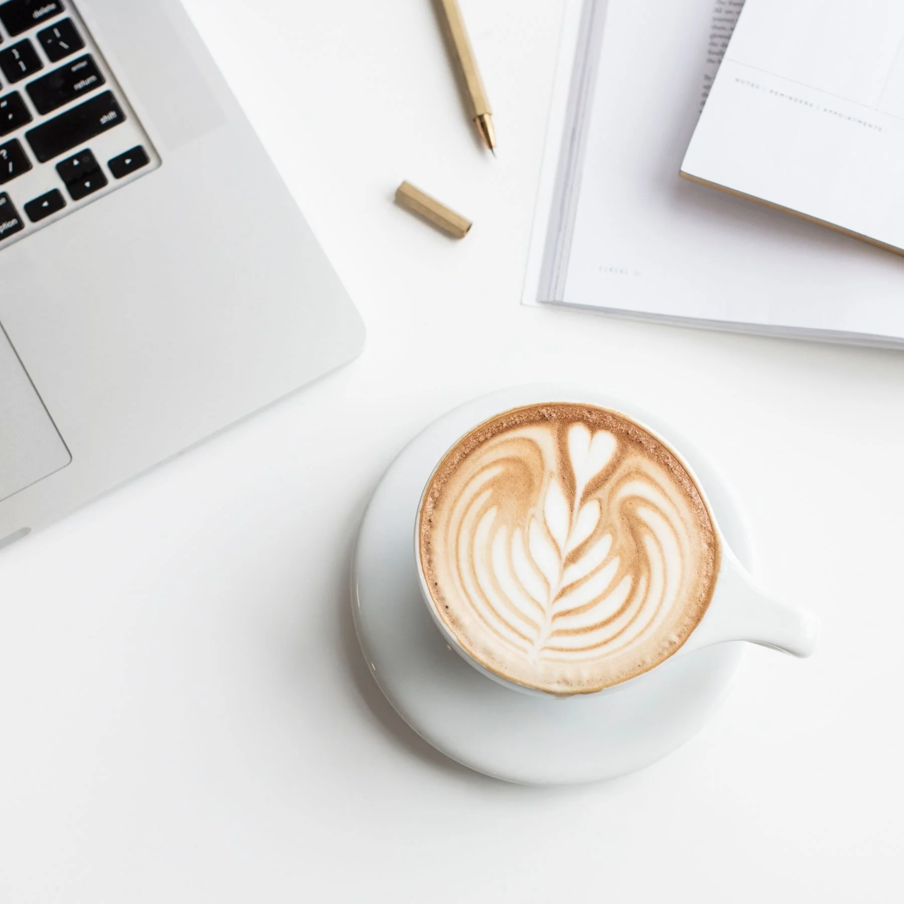 flatlay-cappucino-laptop-notebook-pen