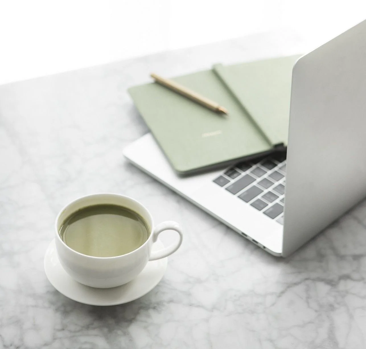 tea-laptop-green-notebook-pencils
