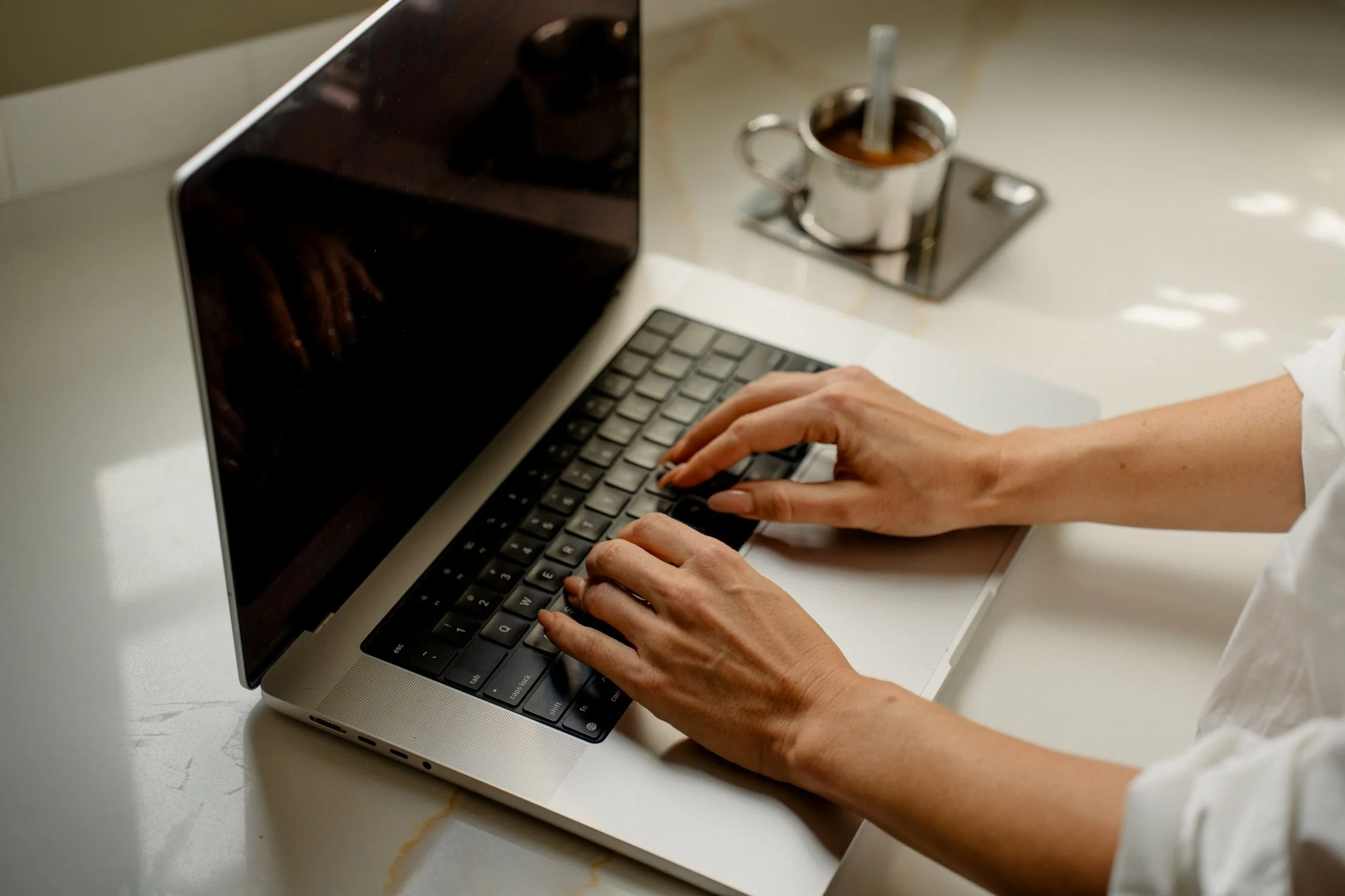 woman-typing on laptop