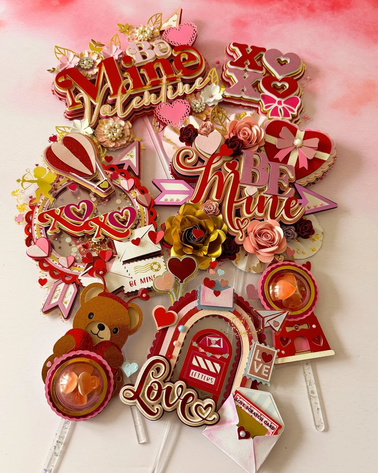These are all the Valentine's Cake Toppers I have made over the last few years on my Cricut. Scroll to see two I made this year 💌

Which one is your favourite? I just can't bear to part with them but my collection is getting a little crazy now 🫣🥰
