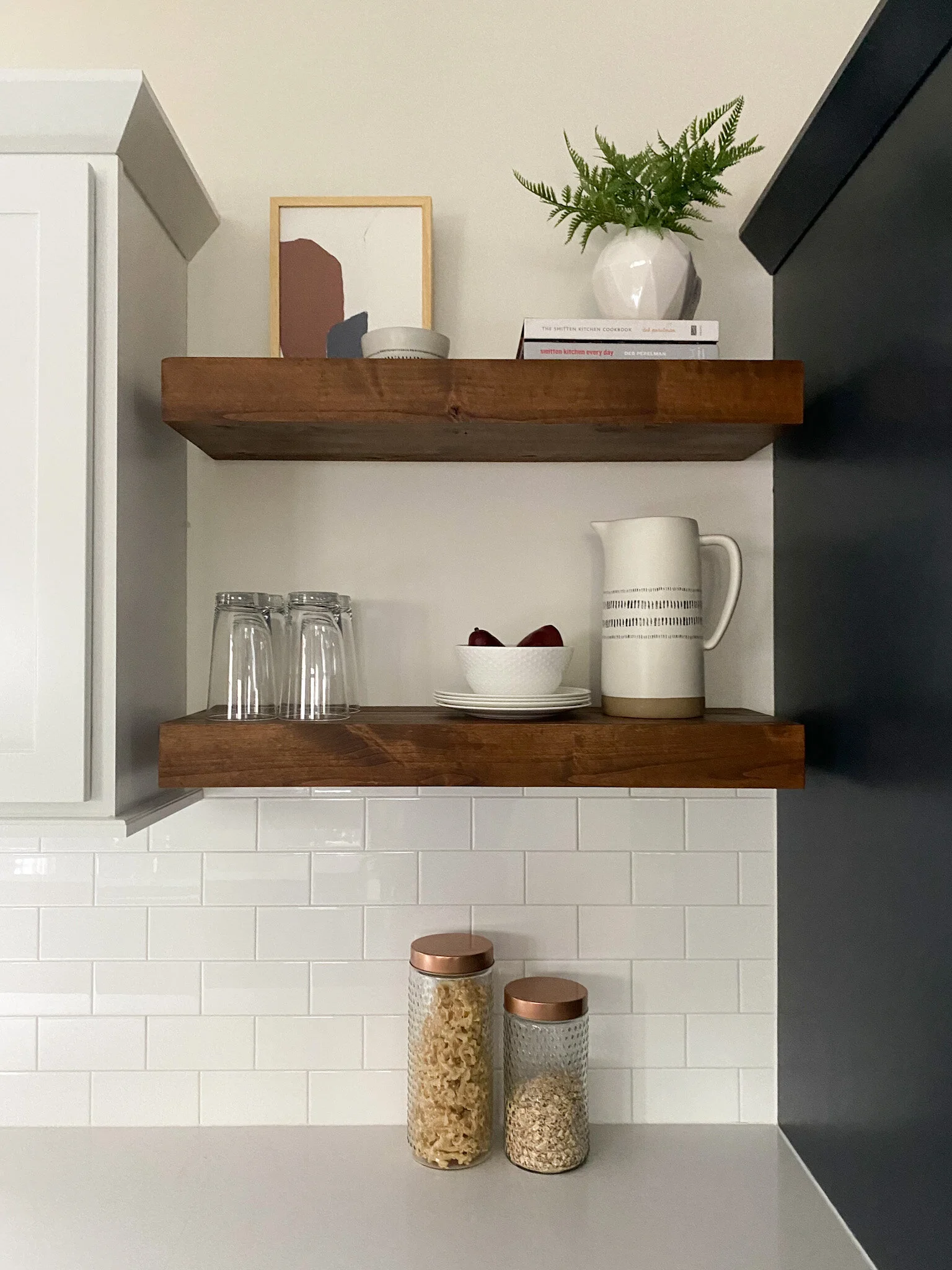 I love a good, meaty, floating shelf. This allows you to display a few pieces that are just too good to hide behind doors!