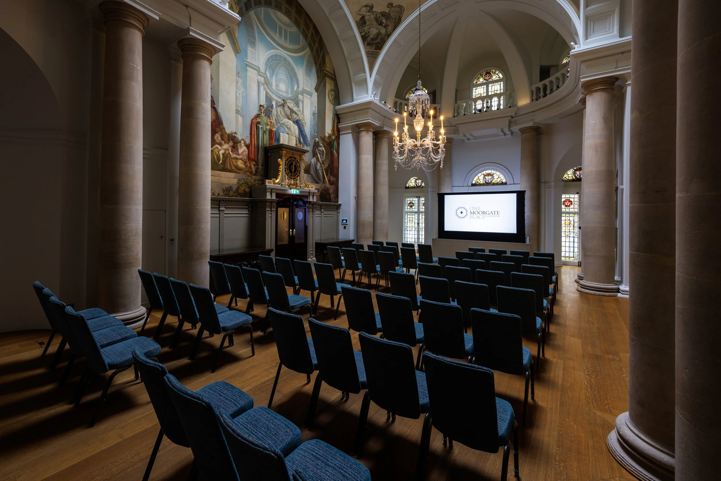 Elegant conference room with projection screen in One Moorgate Place
