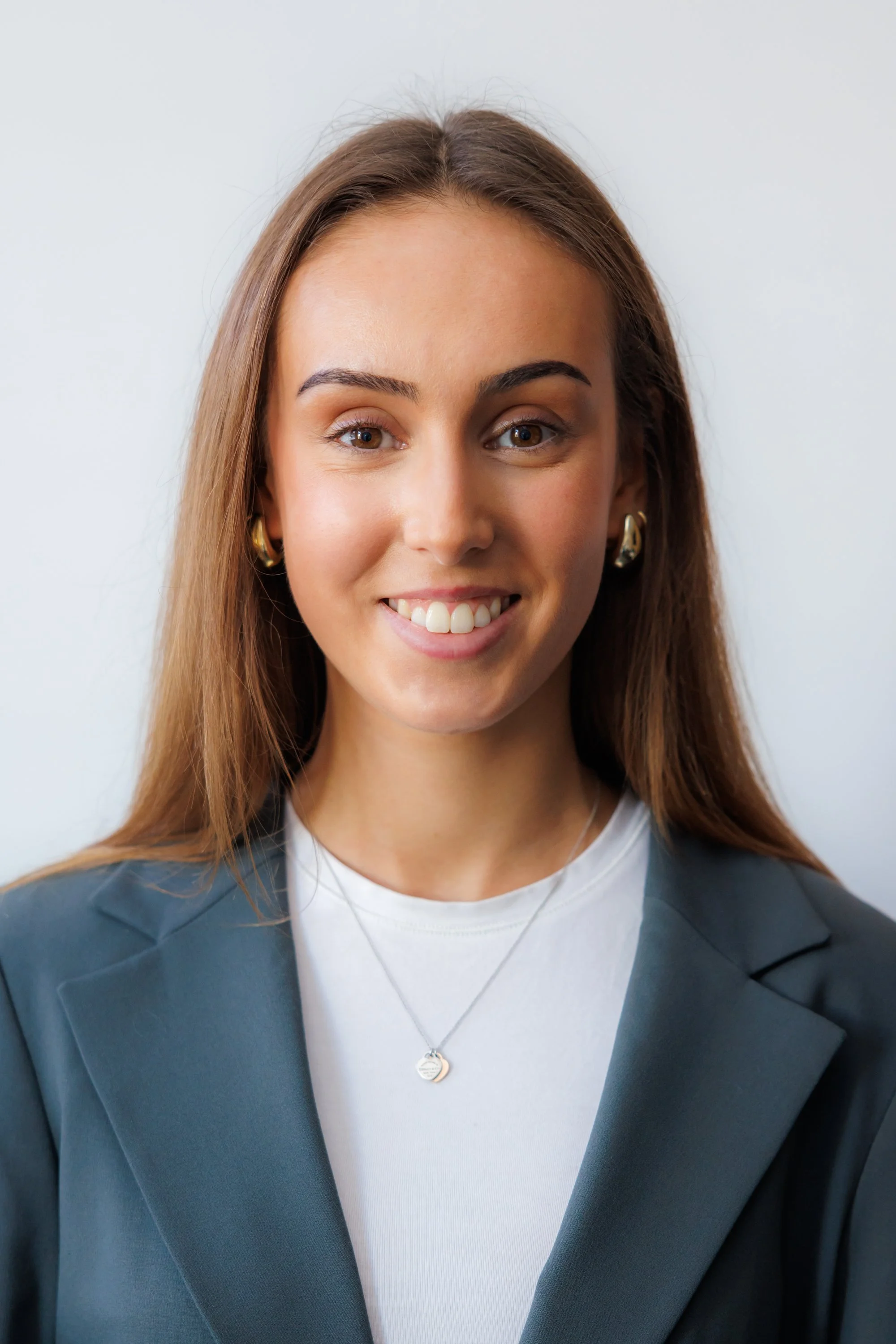 Staff headshot with natural window light 