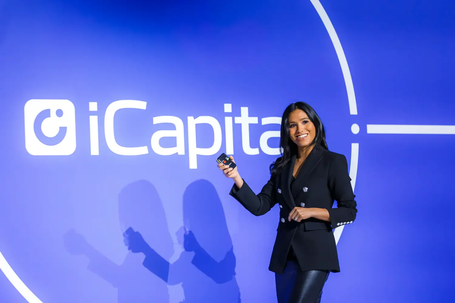 Candid moment of speaker during fintech conference